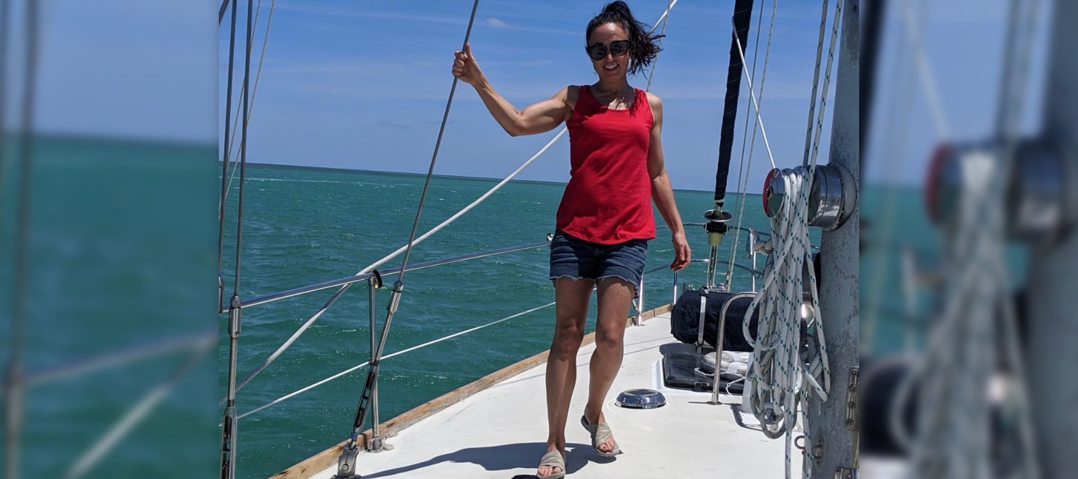 A photo of author Amy Morin on her sailboat