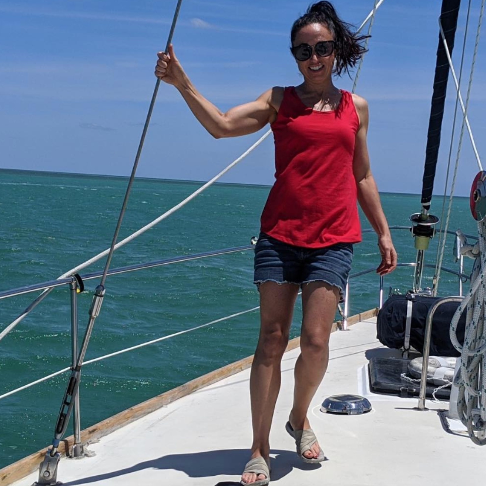 A photo of author Amy Morin on her sailboat