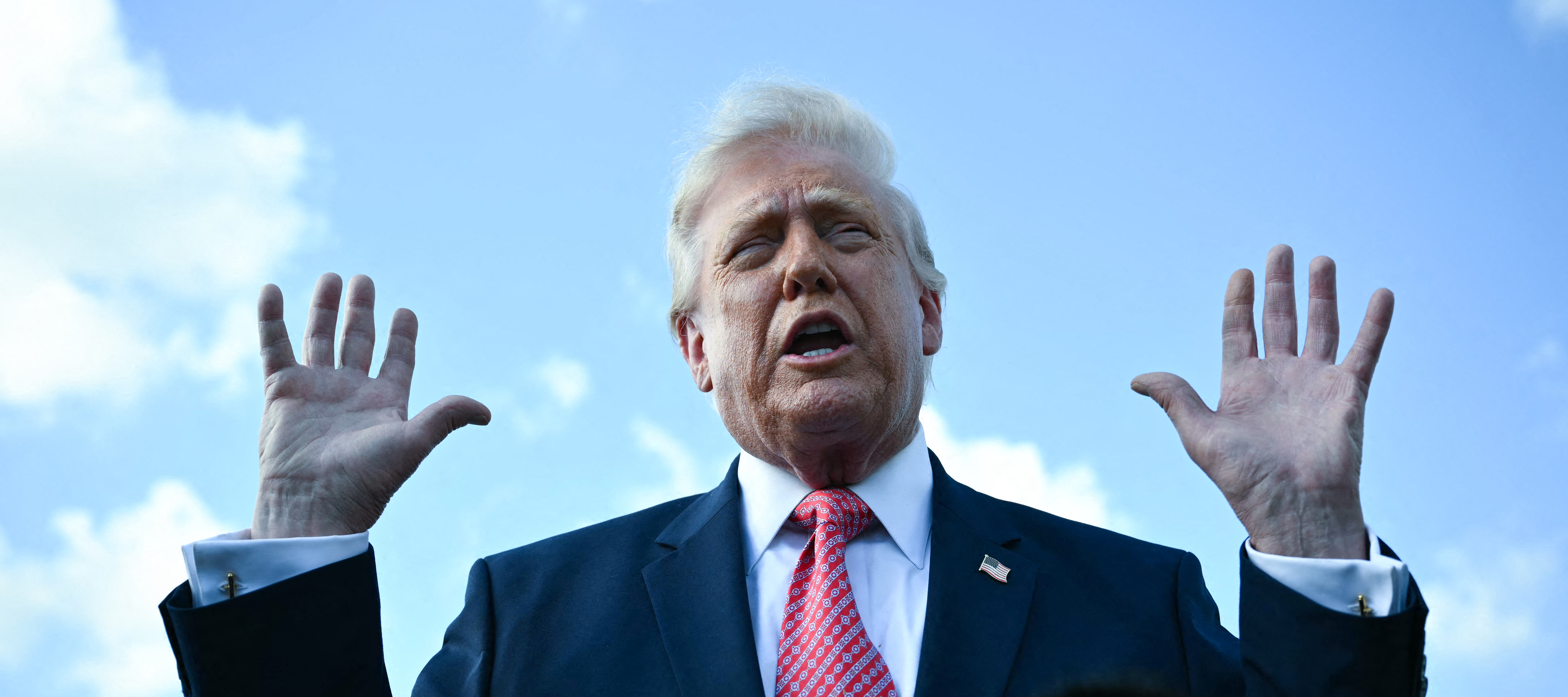 President Donald Trump, seen here speaking to press in Miami, designated the U.S. electric grid as “essential to the national defense.”