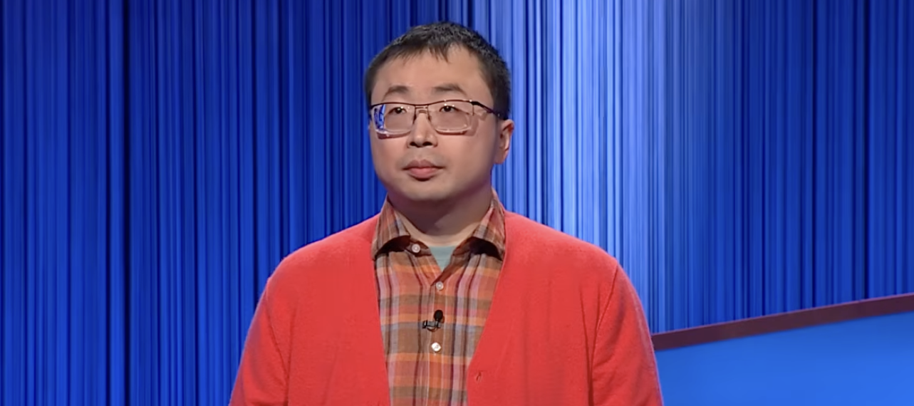 Thirty-one game Jeopardy winner Jamie Ding appears behind the gameshow podium during a recent episode of the trivia show.