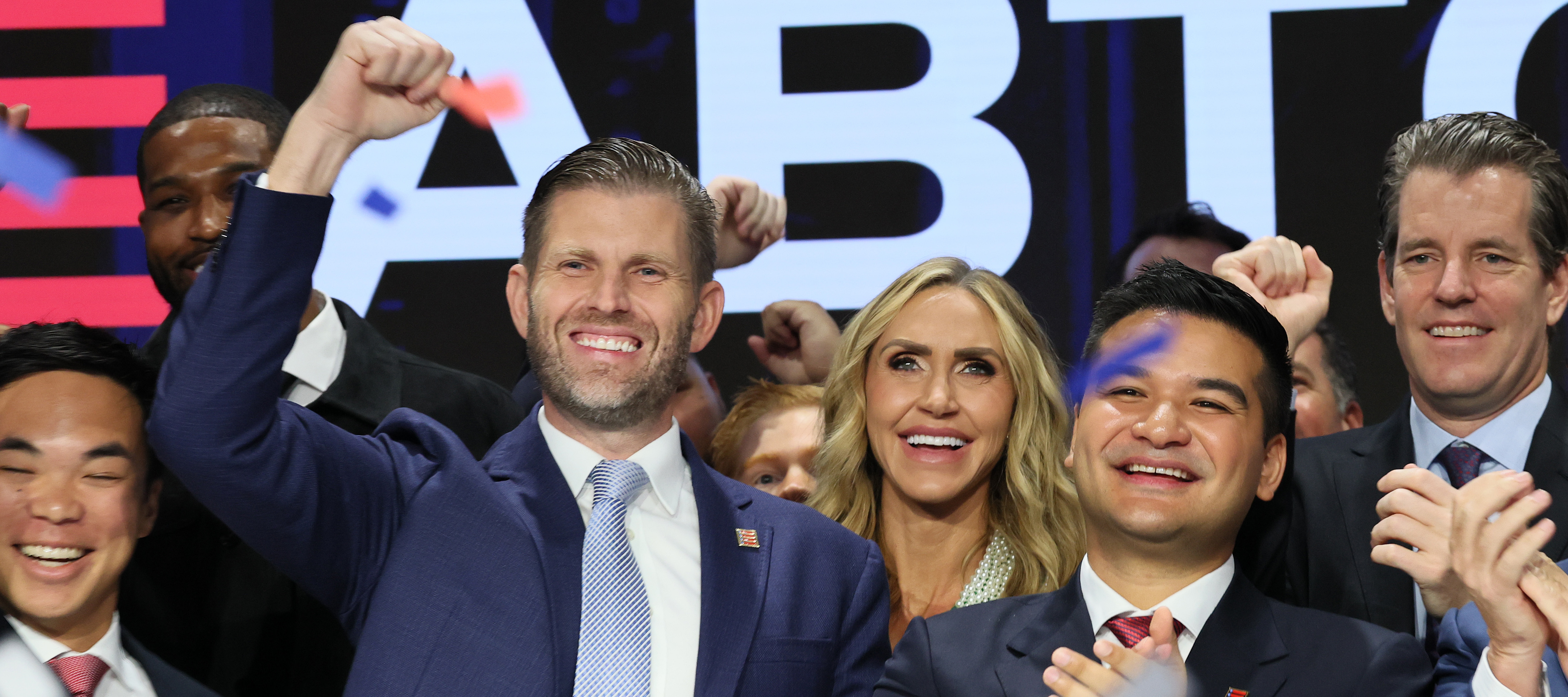 Eric Trump, Co-Founder and Chief Strategy Officer of American Bitcoin and Asher Genoot, Executive Chairman of American Bitcoin, ring the opening bell at the Nasdaq headquarters.