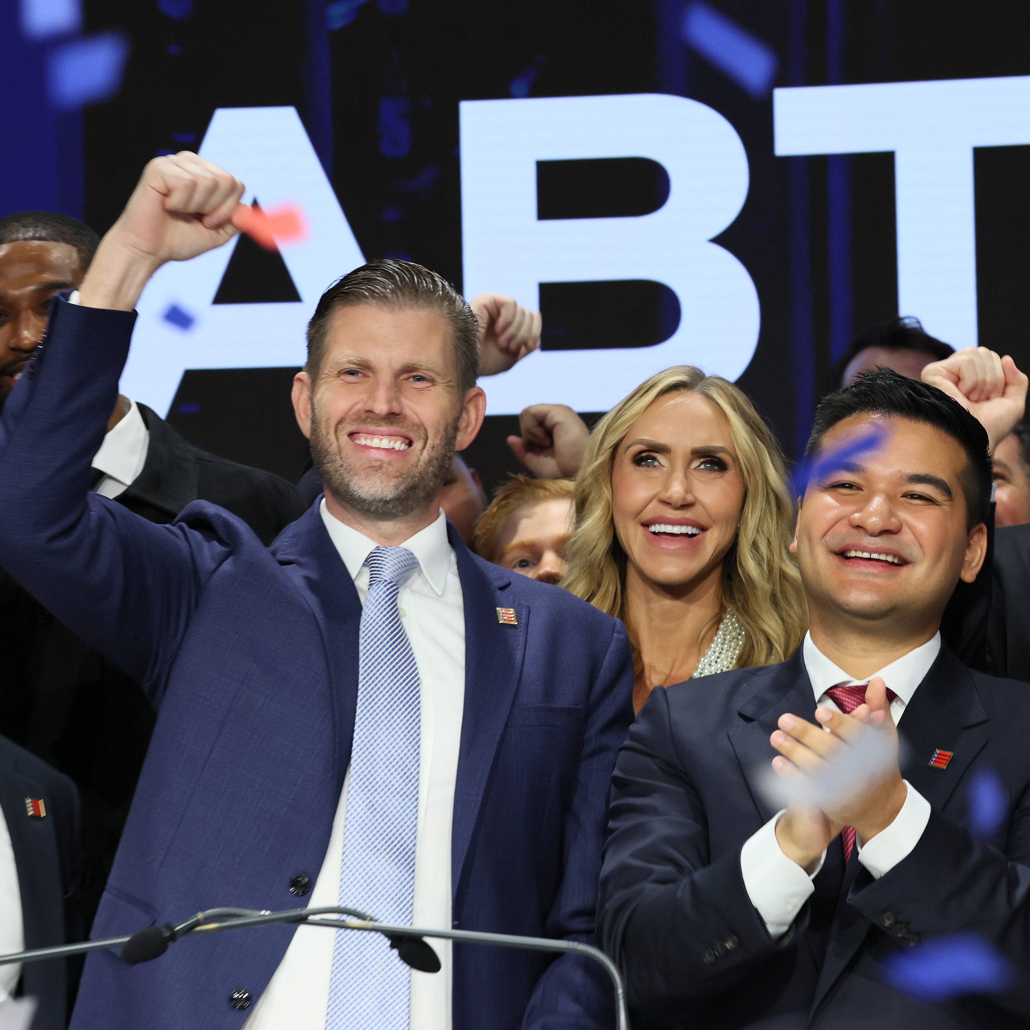 Eric Trump, Co-Founder and Chief Strategy Officer of American Bitcoin and Asher Genoot, Executive Chairman of American Bitcoin, ring the opening bell at the Nasdaq headquarters.