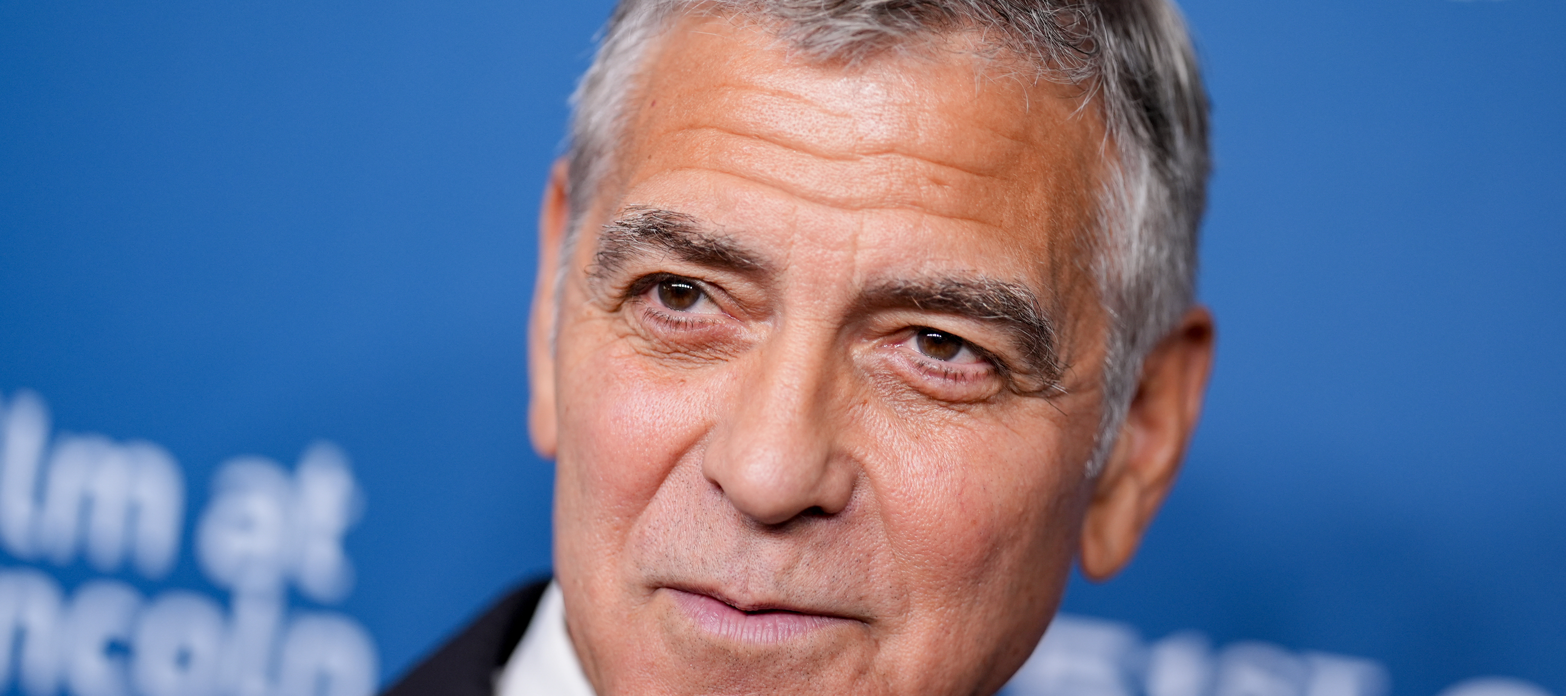 A close-up photo of George Clooney wearing a nice tuxedo