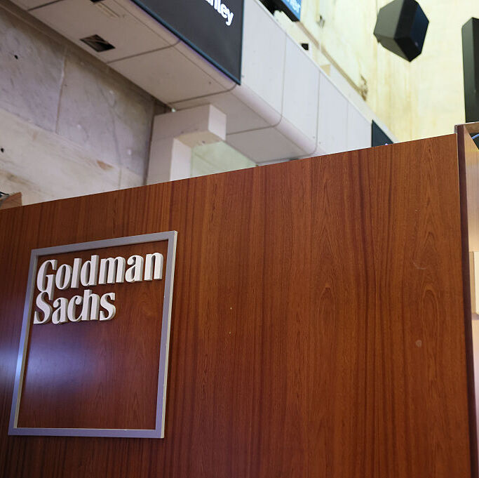 A photo of the Goldman Sachs logo at the New York Stock Exchange