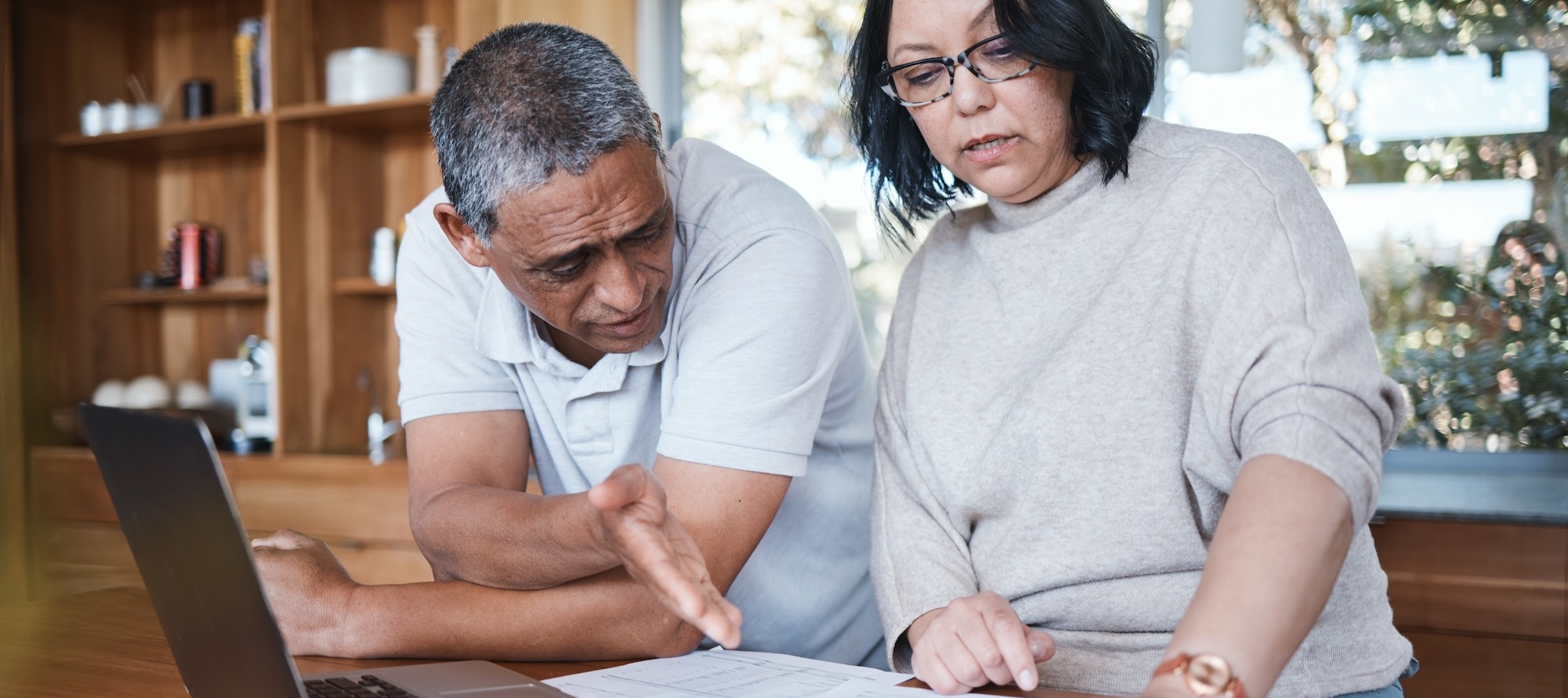 Mature couple reviewing their finances