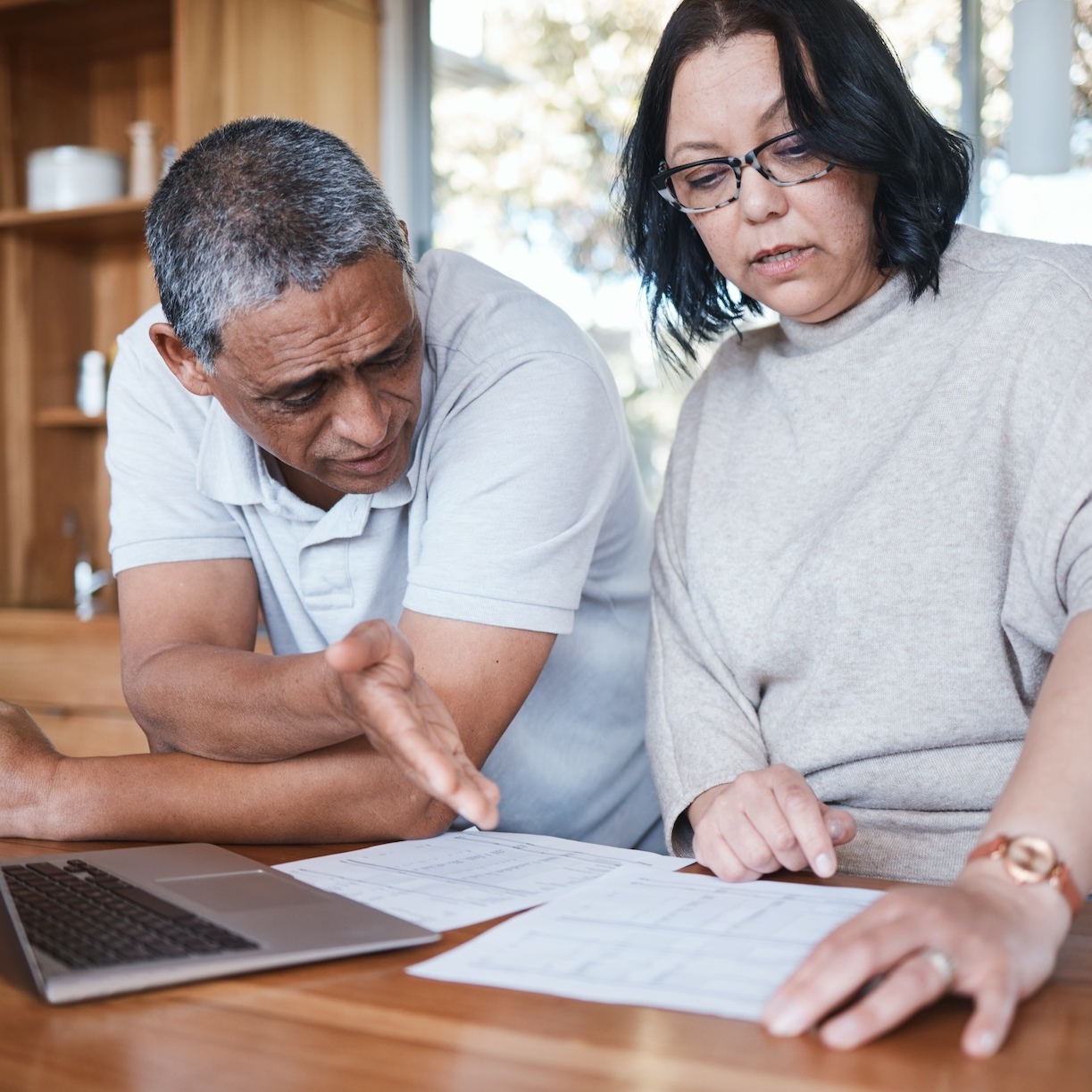 Mature couple reviewing their finances