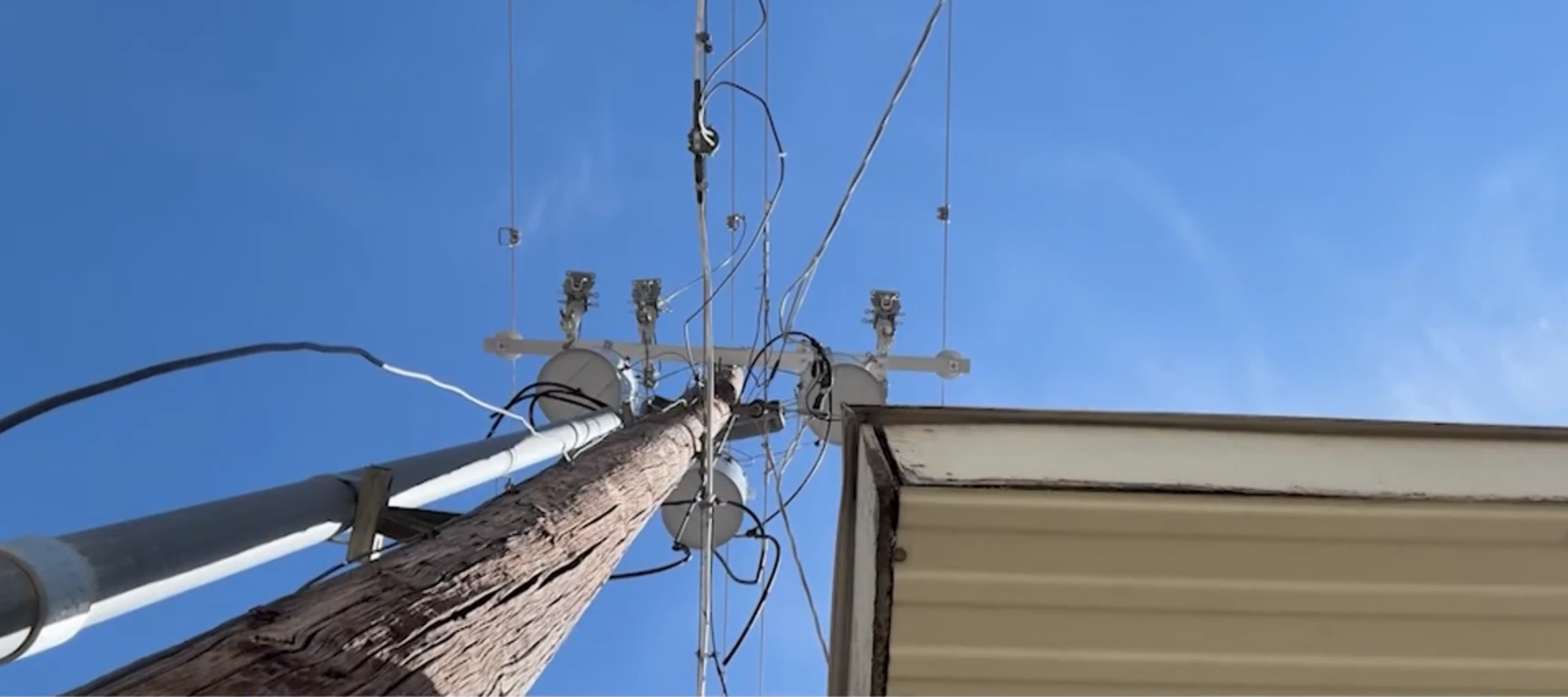 A garage was built around a hydro pole in 1977 in Utah.