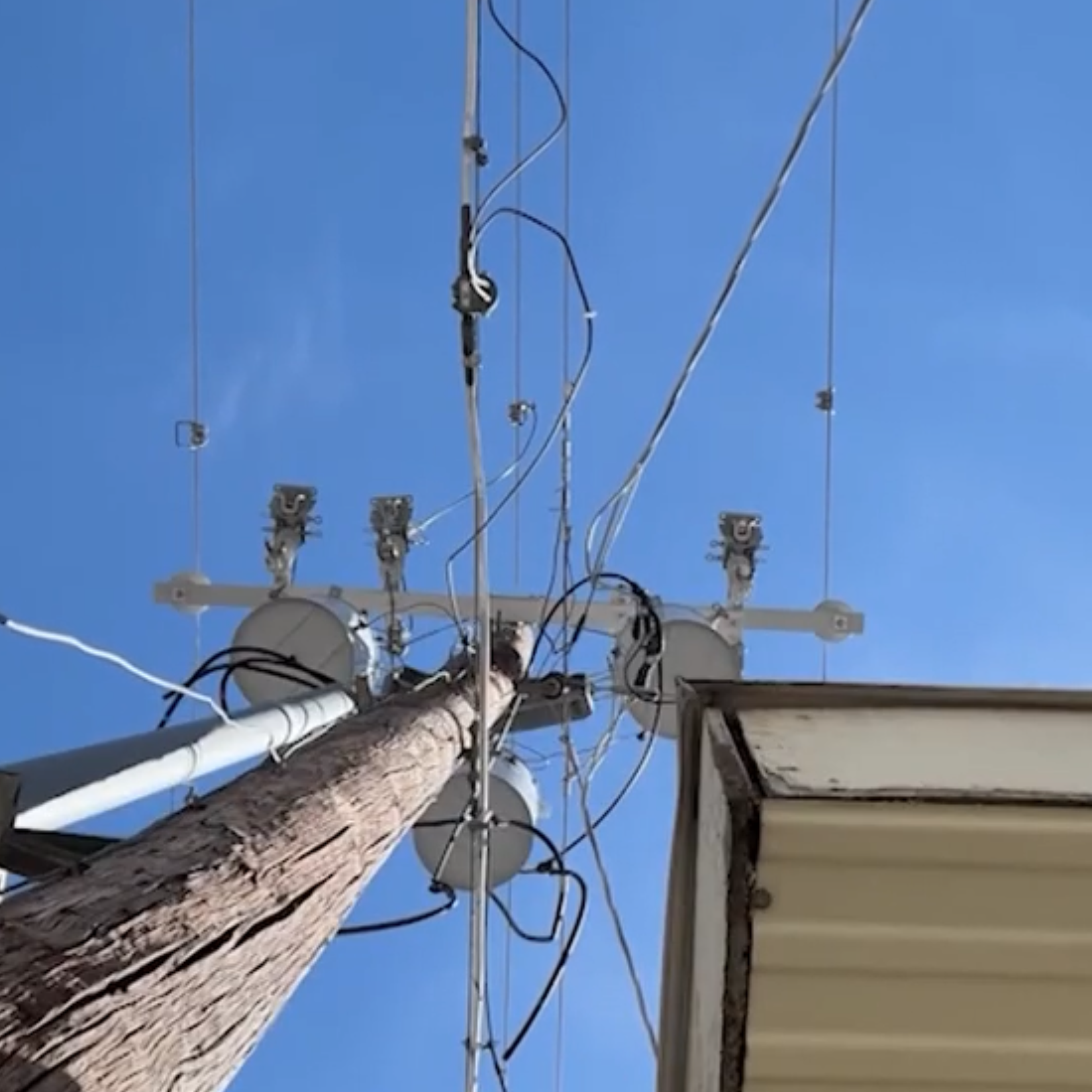 A garage was built around a hydro pole in 1977 in Utah.