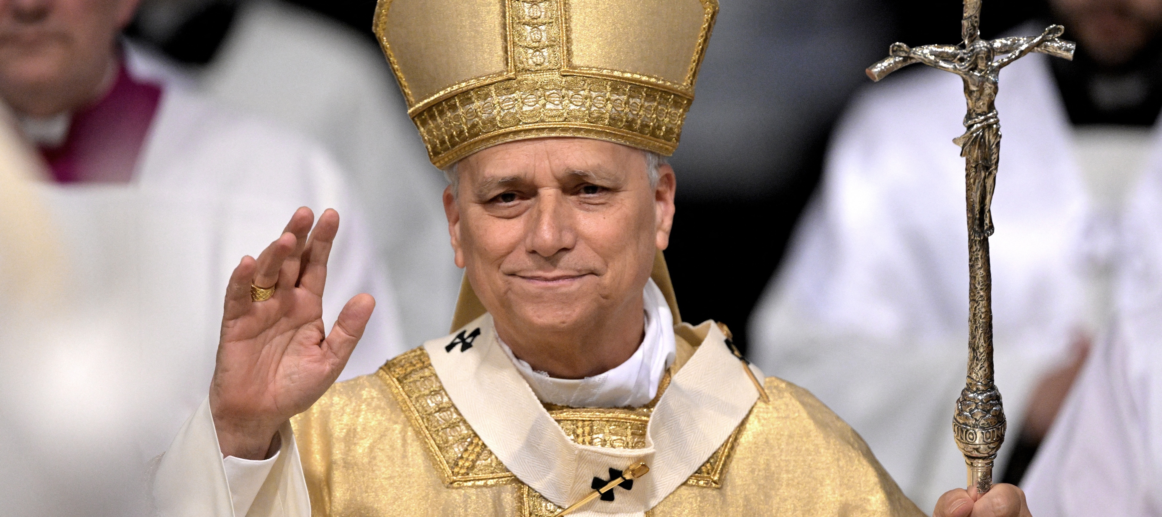 Pope Leo XIV gestures as he arrives at the Basilica of San Giovanni