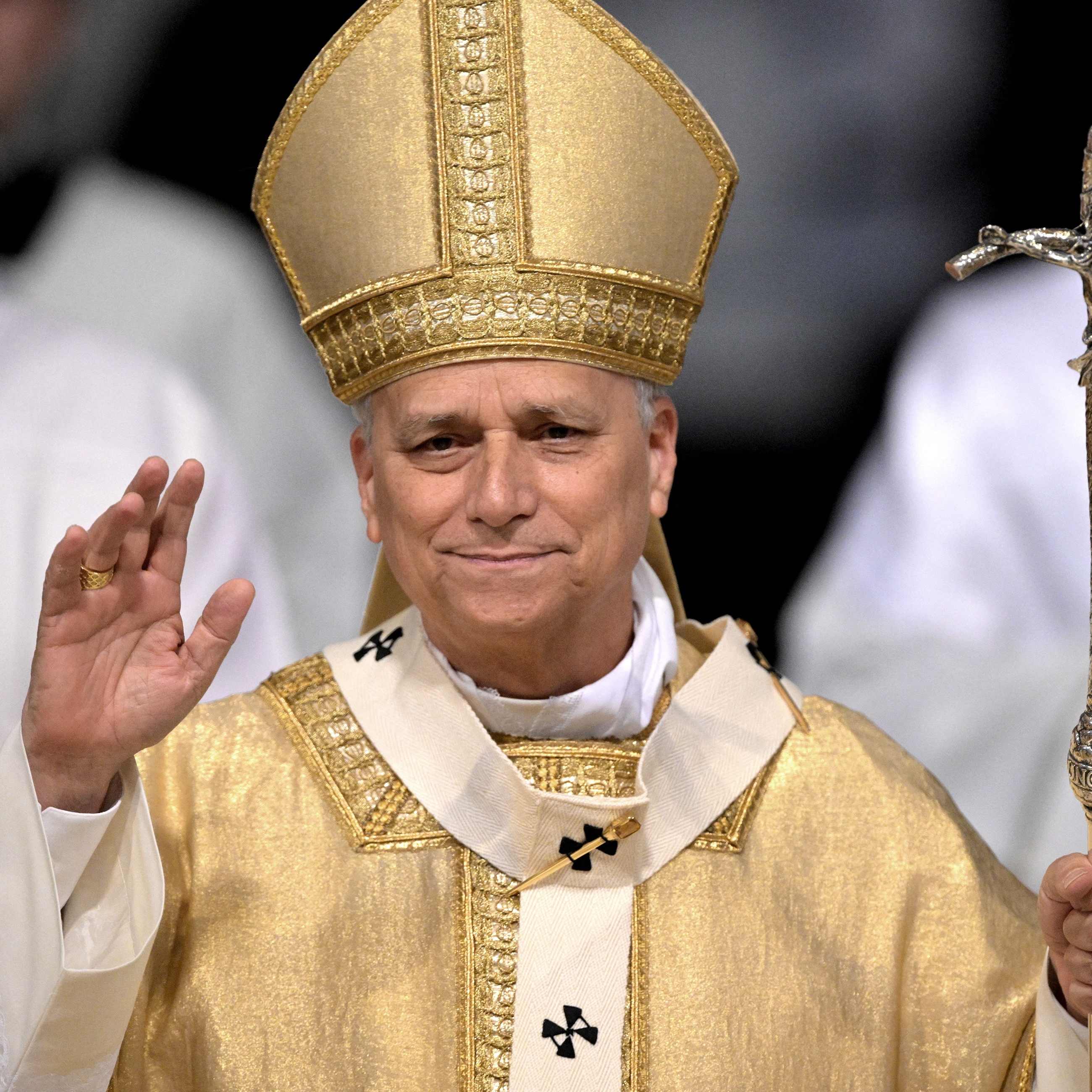 Pope Leo XIV gestures as he arrives at the Basilica of San Giovanni