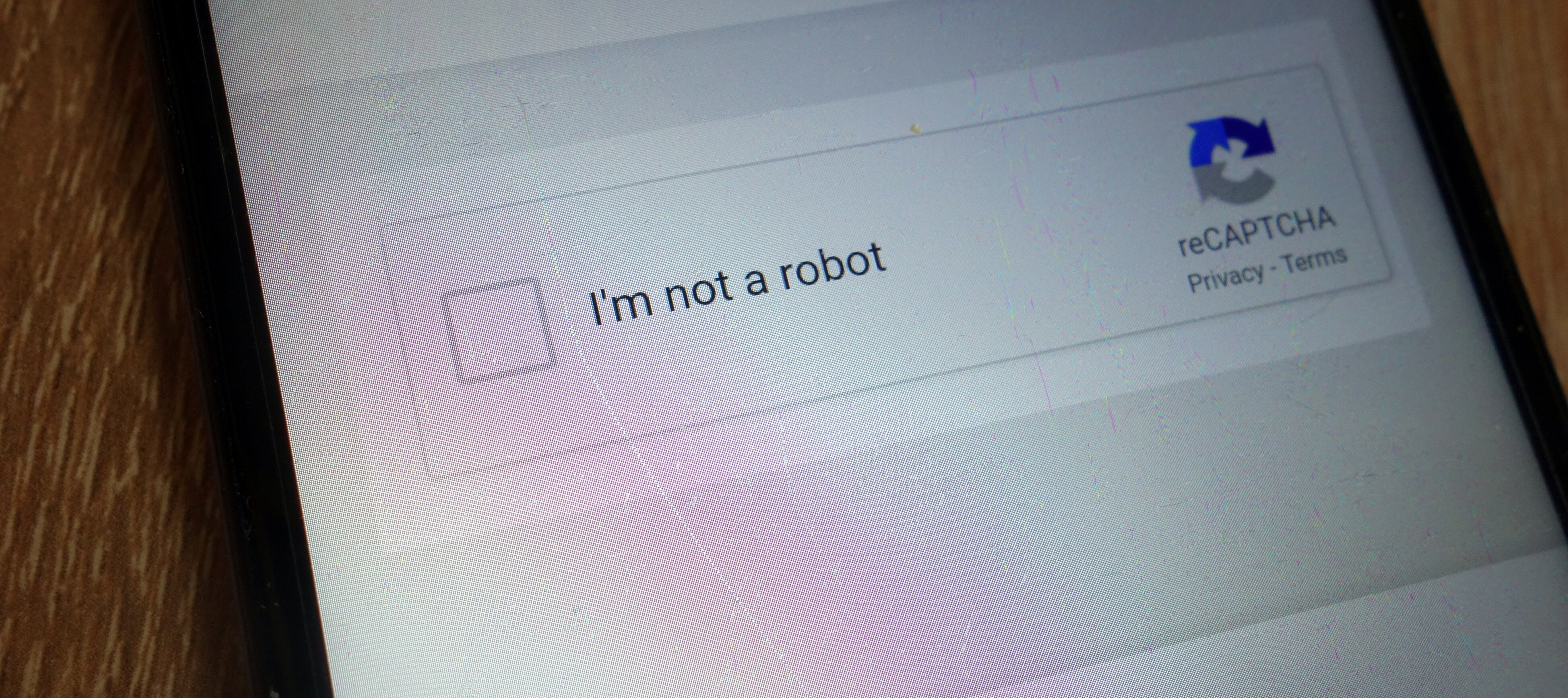 A captcha is shown on a mobile device.