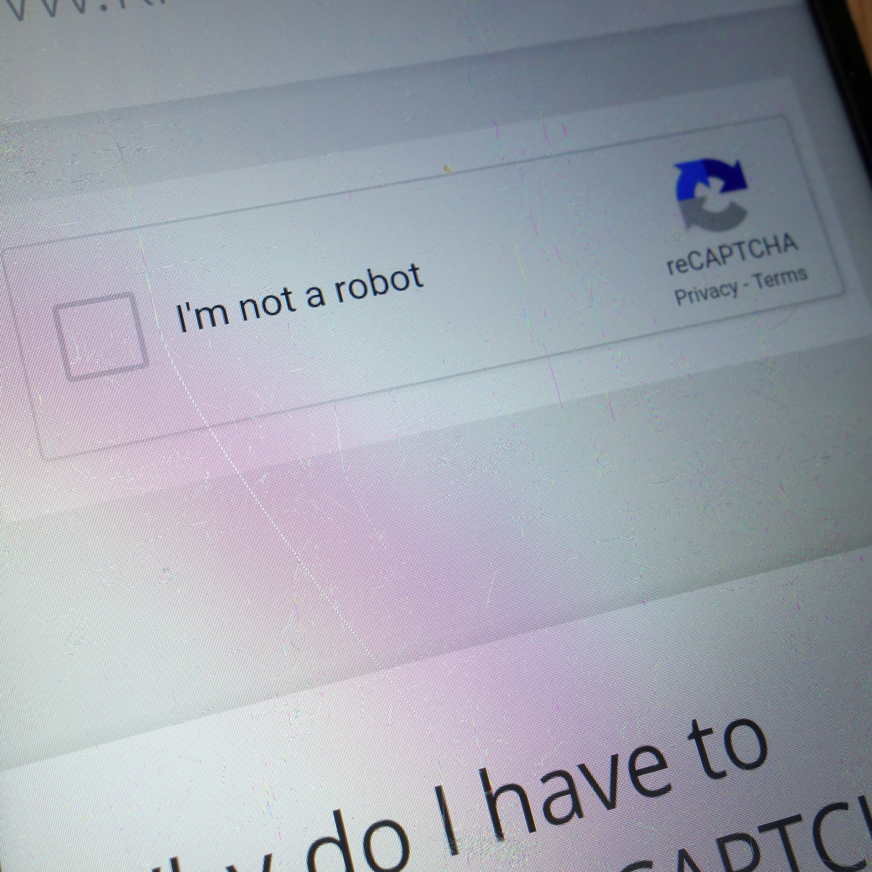 A captcha is shown on a mobile device.