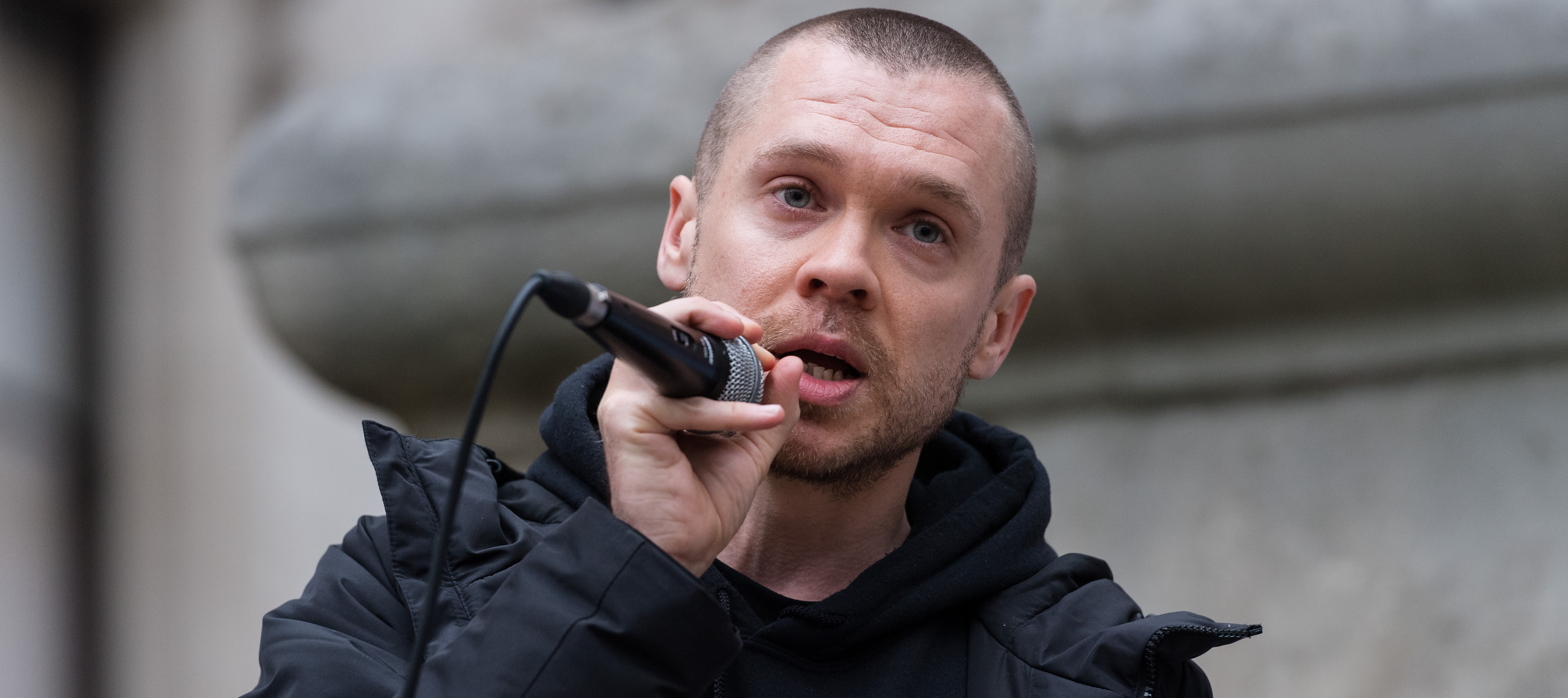 Gary Stevenson speaks at a rally in London.