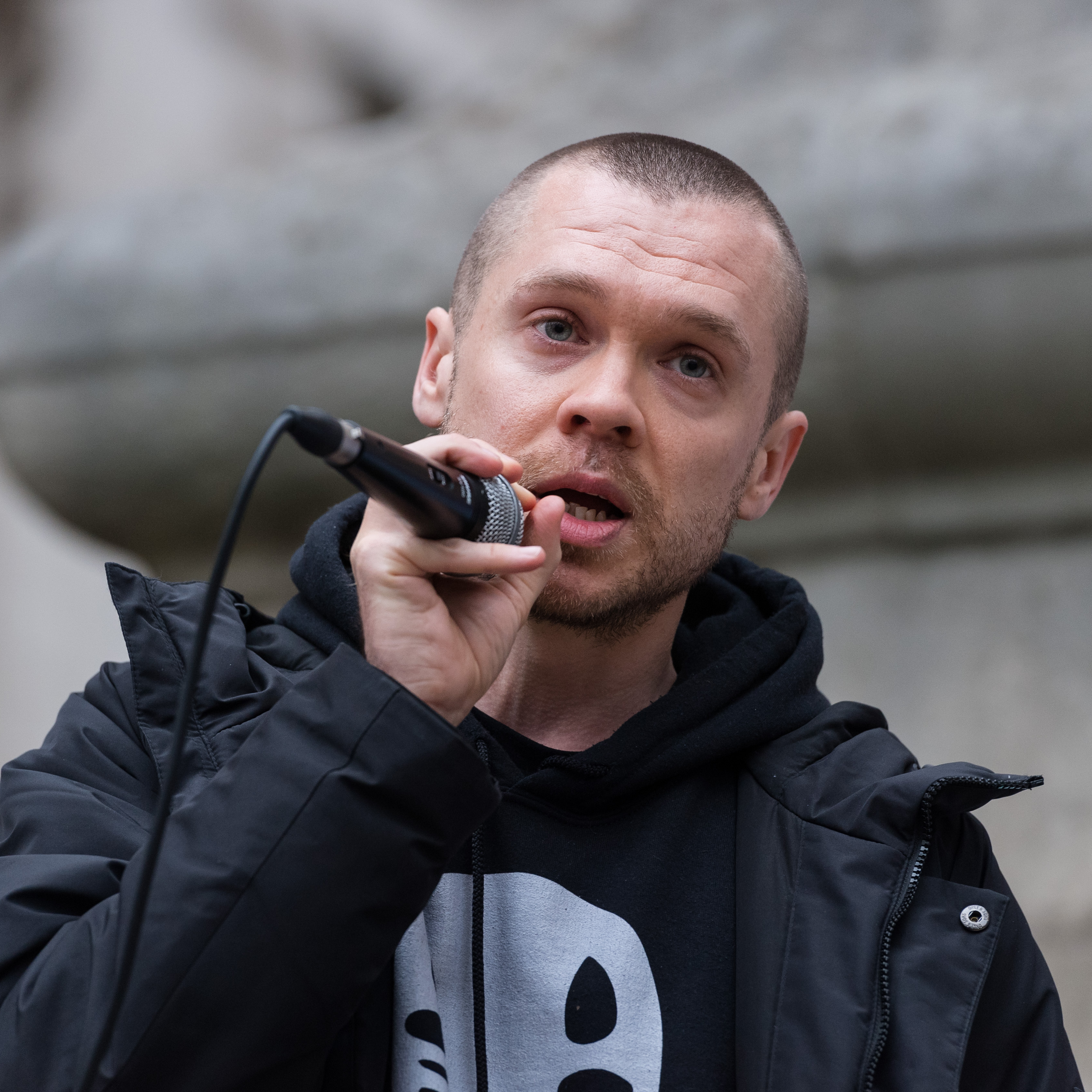 Gary Stevenson speaks at a rally in London.