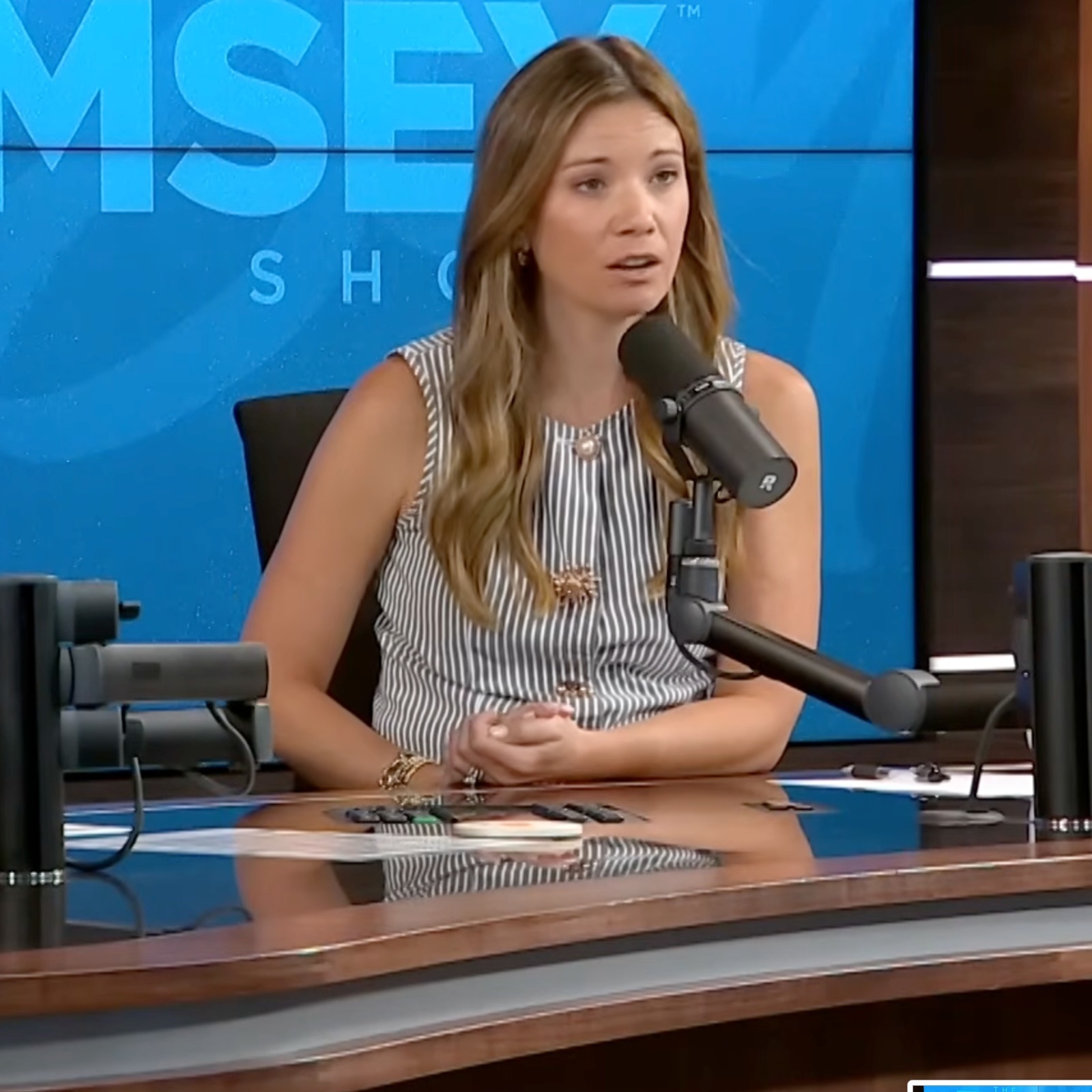 Hosts George Kamel and Rachel Cruze offer advice to a caller.