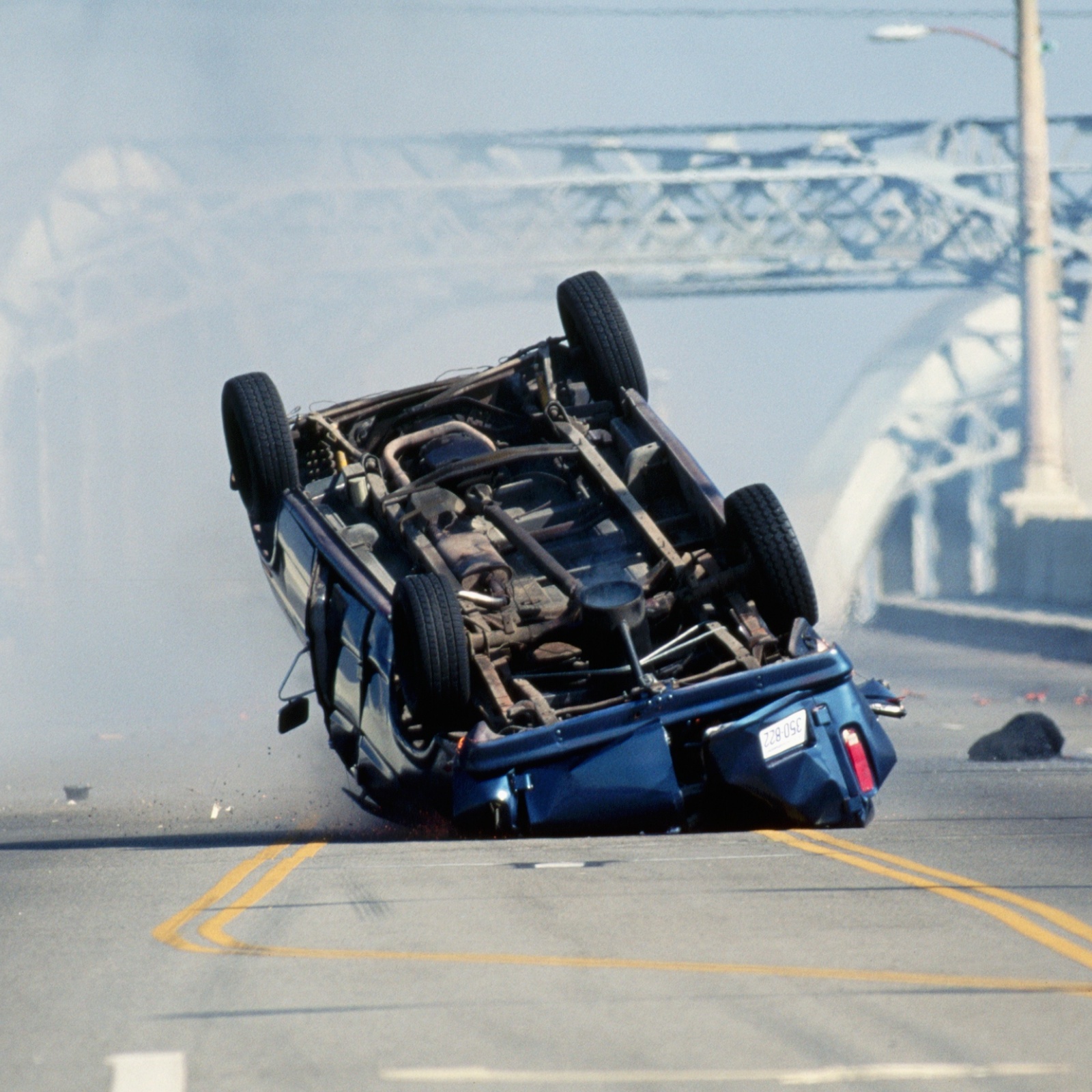 A car crashes as a stunt during the filming of a movie