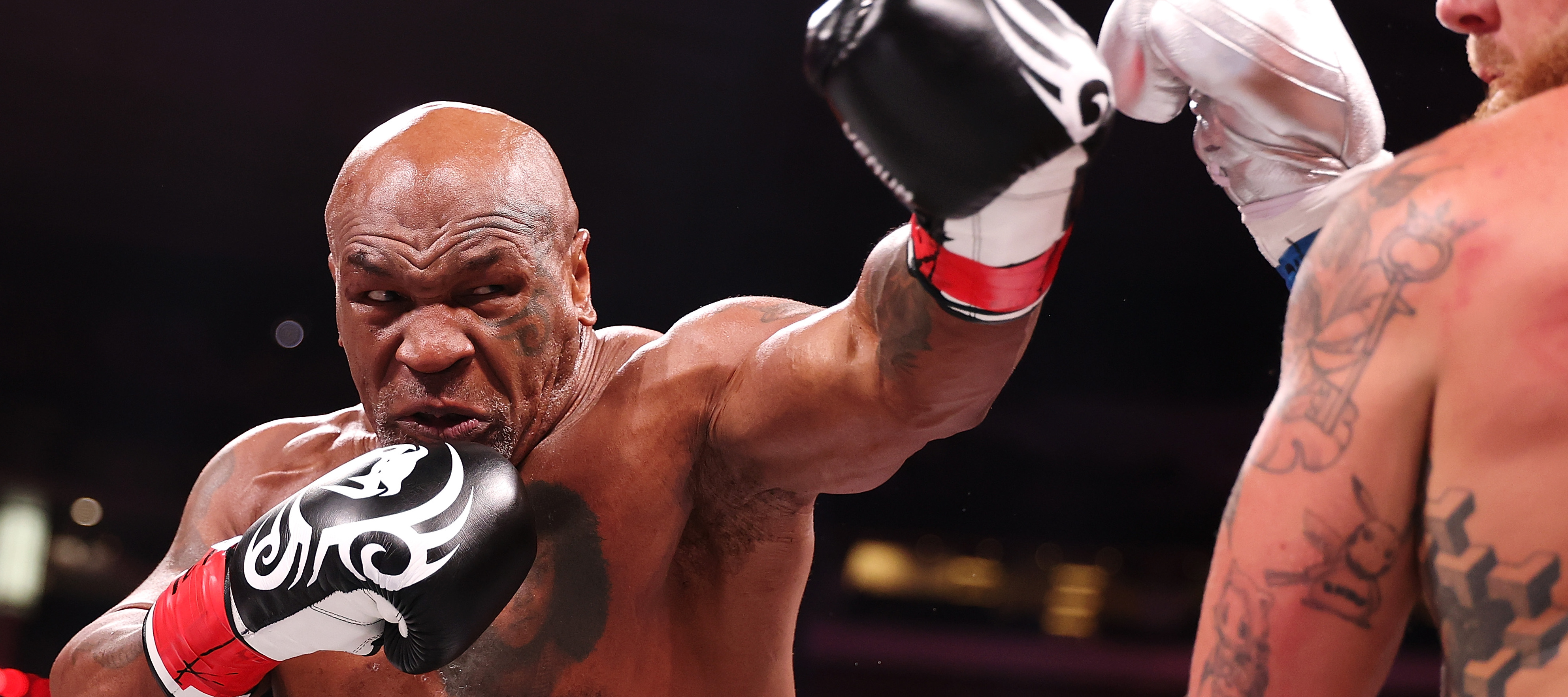 Mike Tyson and Jake Paul are seen fighting during the LIVE on Netflix: Jake Paul vs. Mike Tyson event on November 15, 2024.