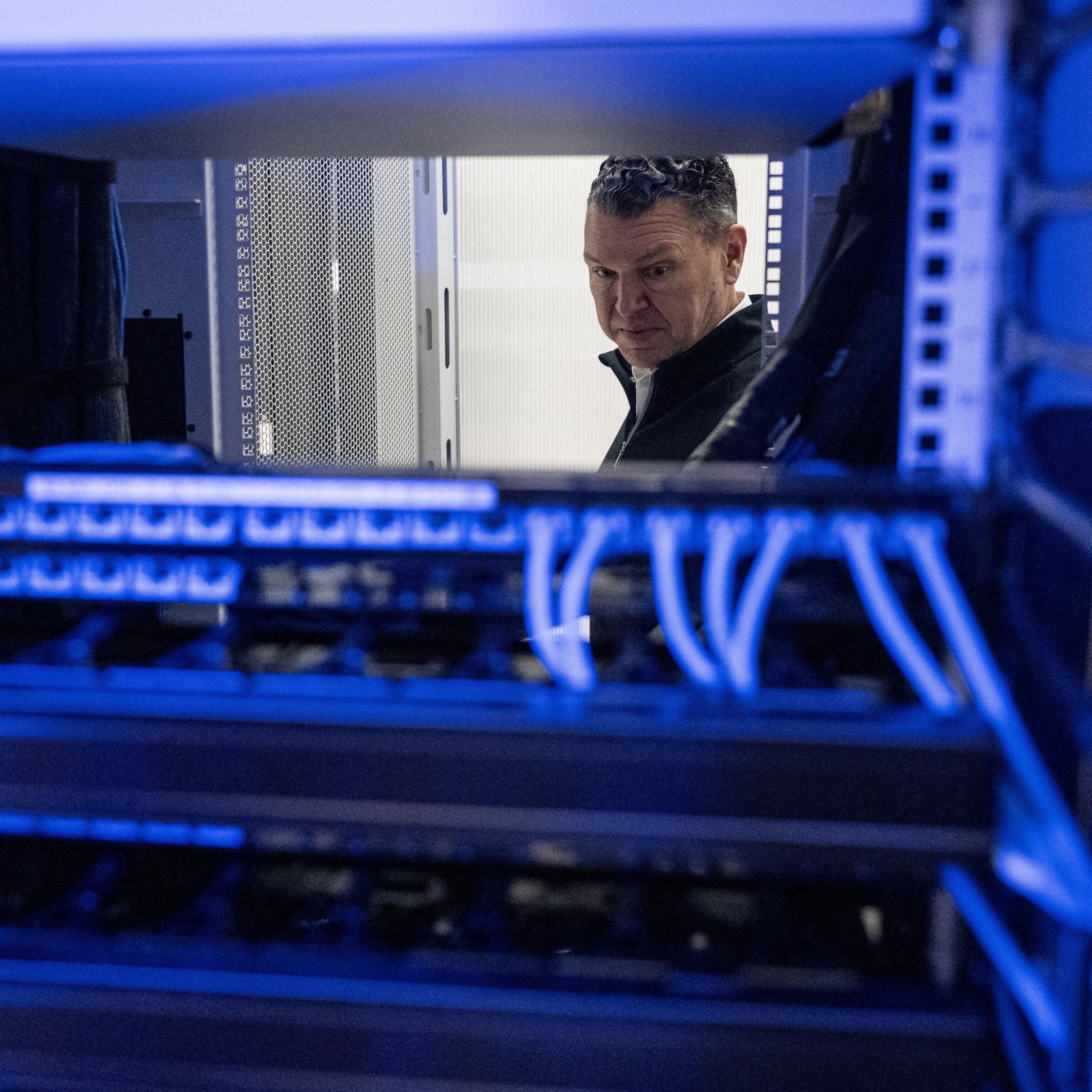 Chris Sharp, Chief Technology Officer of Digital Realty, looks at active servers in the Digital Realty Innovation Lab (DRIL) data center in Ashburn, Virginia.