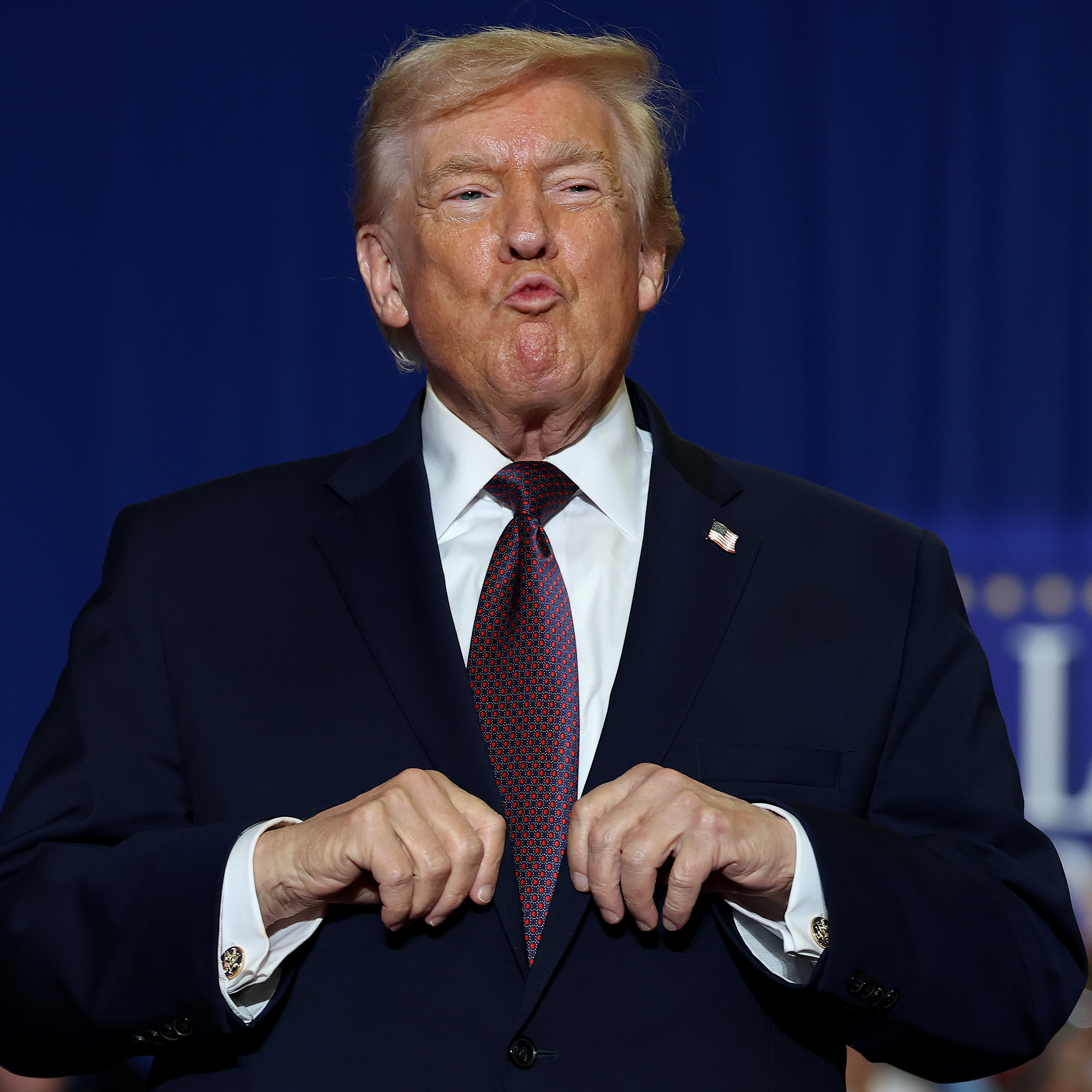 U.S. President Donald Trump takes the stage during a rally at the Rocky Mount Event Center on December 19, 2025 in Rocky Mount, North Carolina.