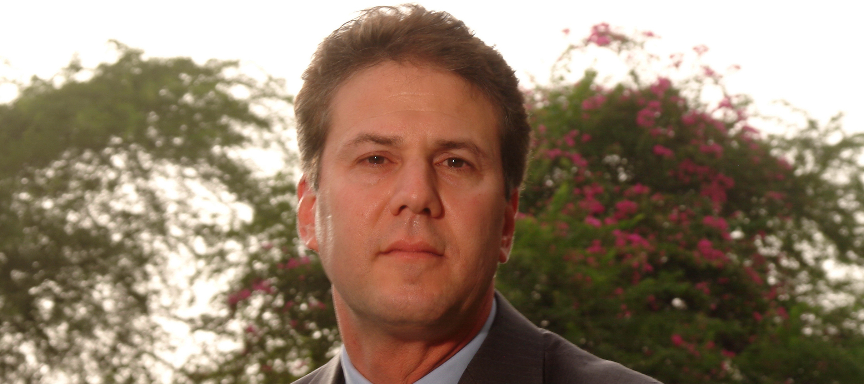 Kenneth Tuchman, chairman and chief executive officer TTEC Holdings, Inc., poses at outdoor location.