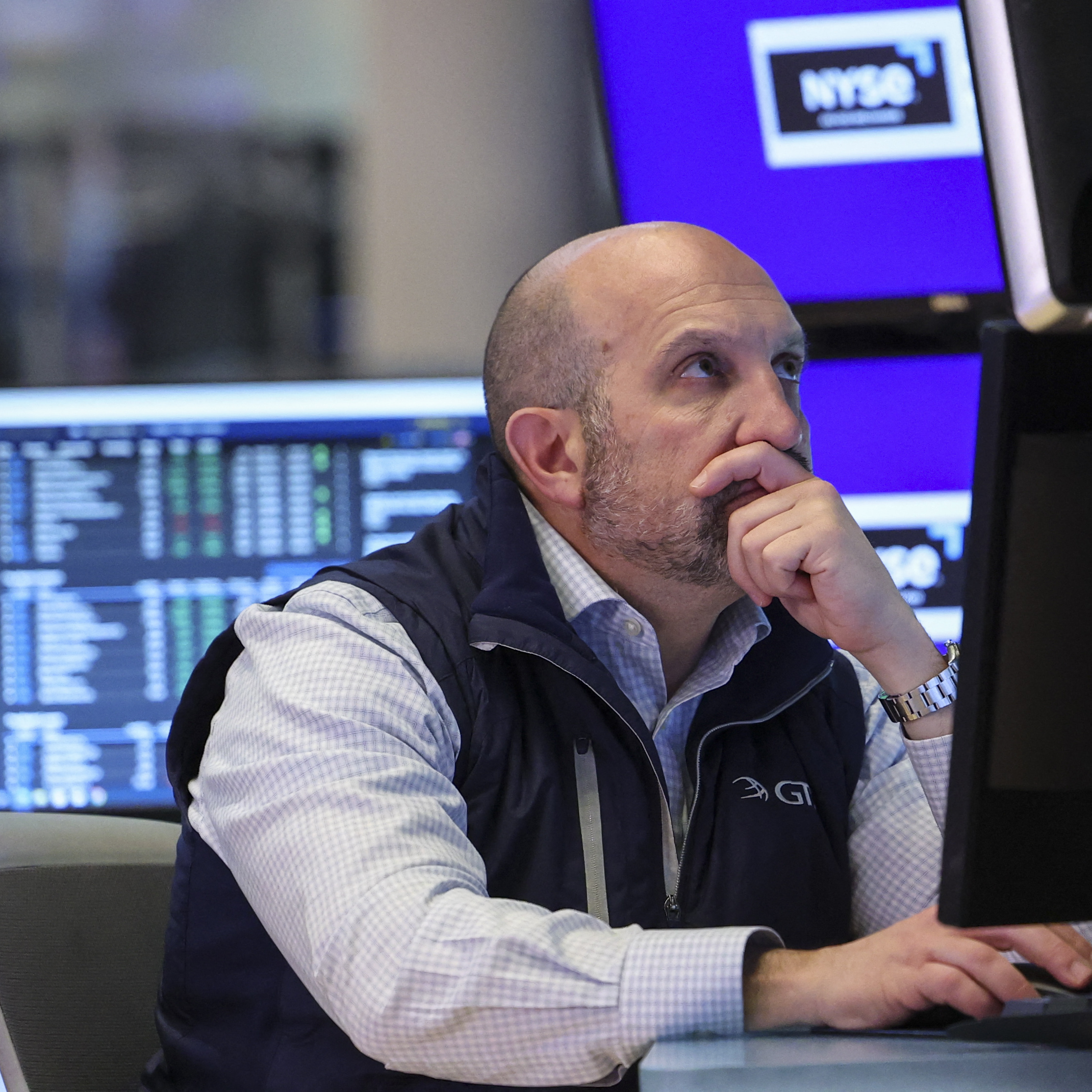 A trader works at the New York Stock Exchange in New York on April 22, 2026.