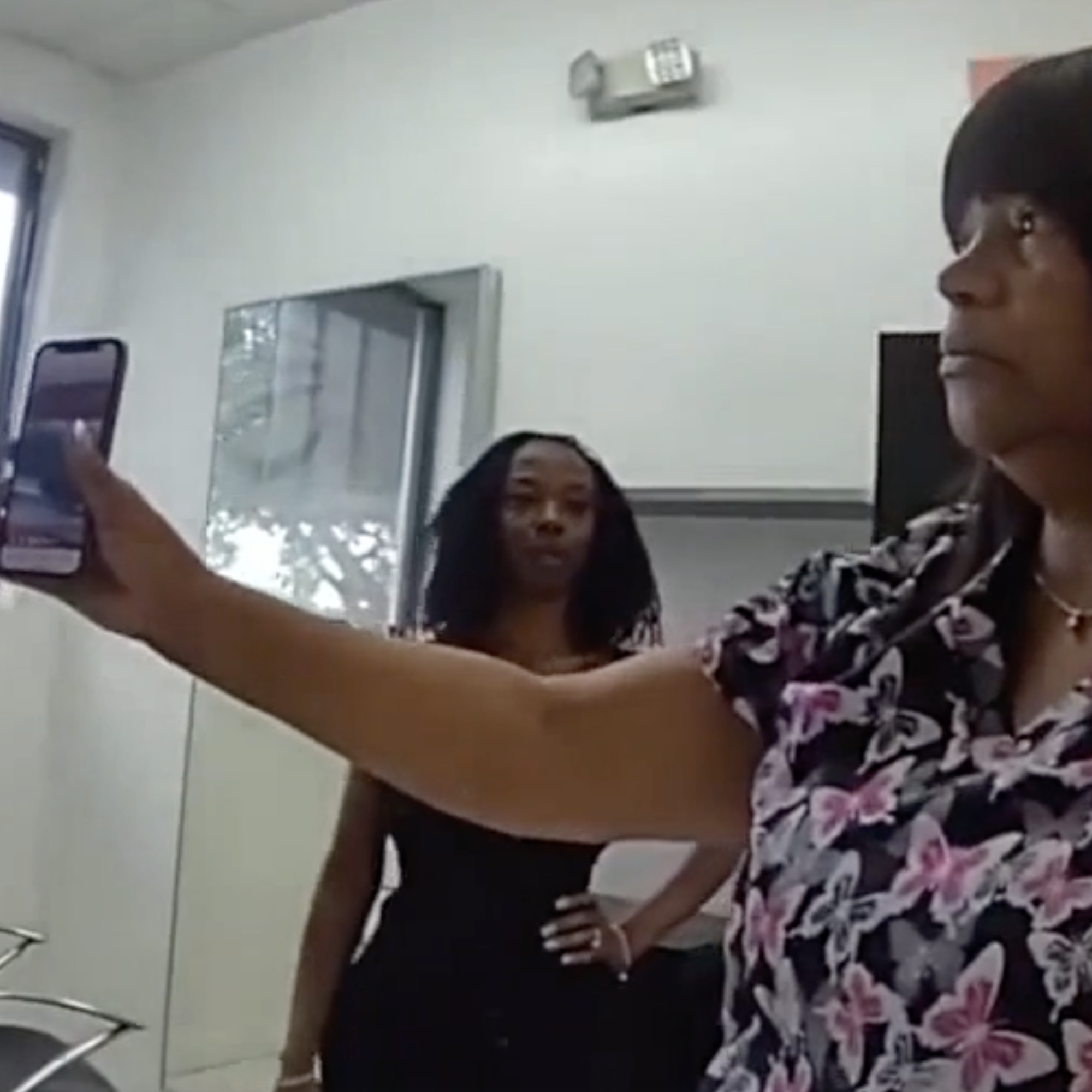 Kathy Monroe shares video of her altercation with salon owner Tyronese Bivens.