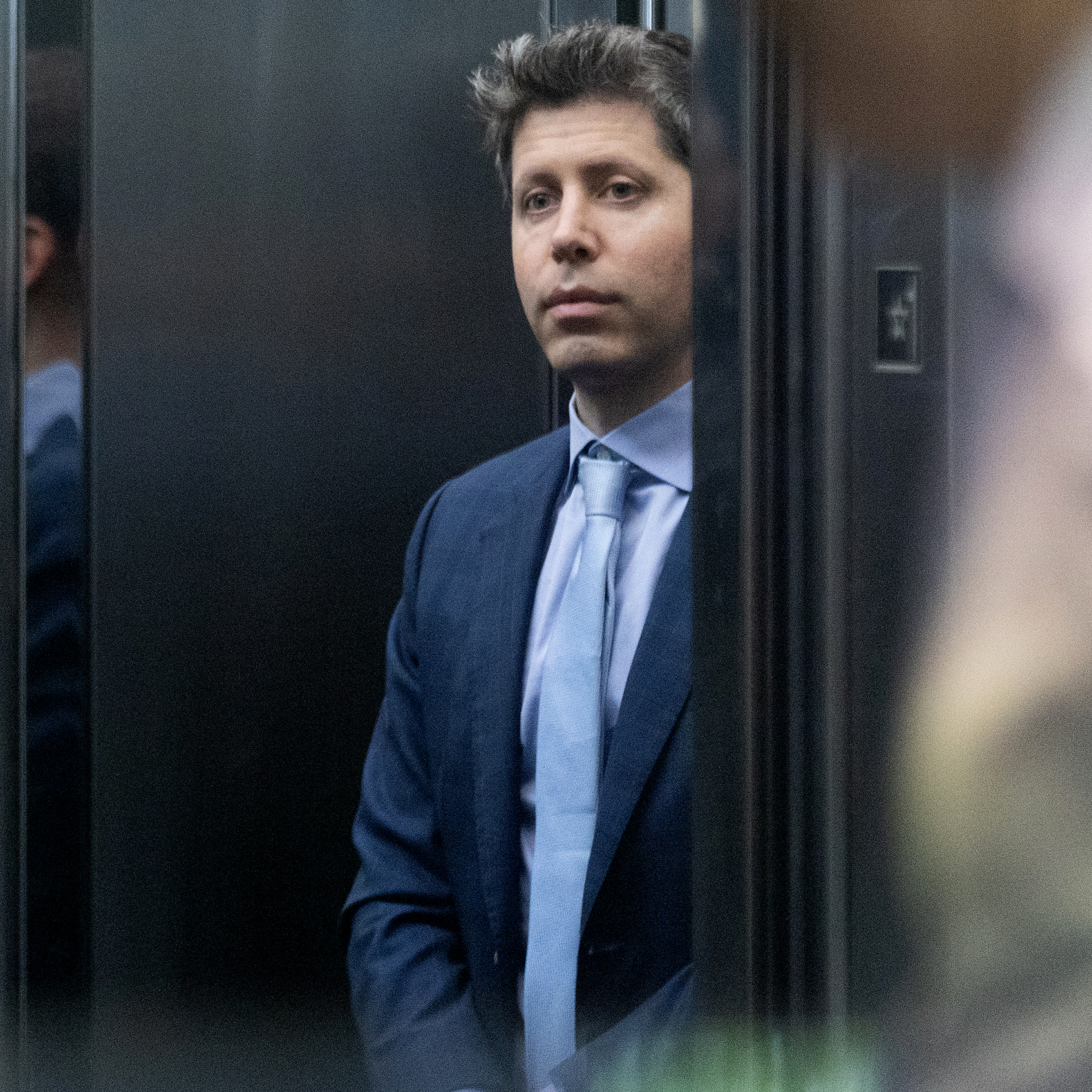 Sam Altman arrives to court