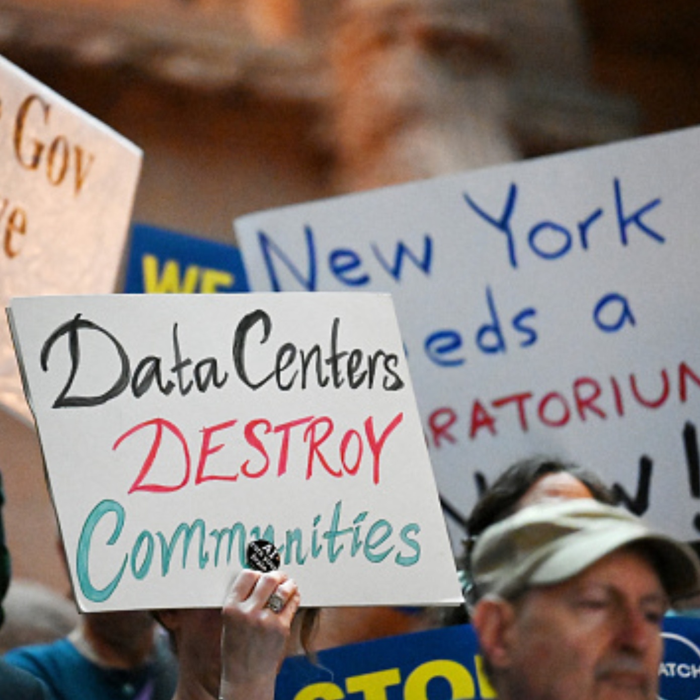 Left: Construction of a data center in Saline, Michigan Right: Protest against data centers in Albany, New York