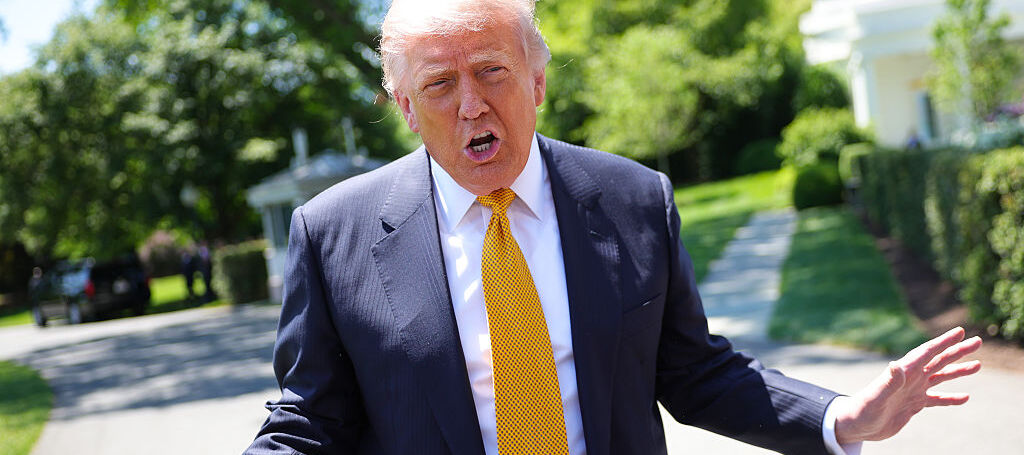 A photo of Donald Trump wearing a yellow tie