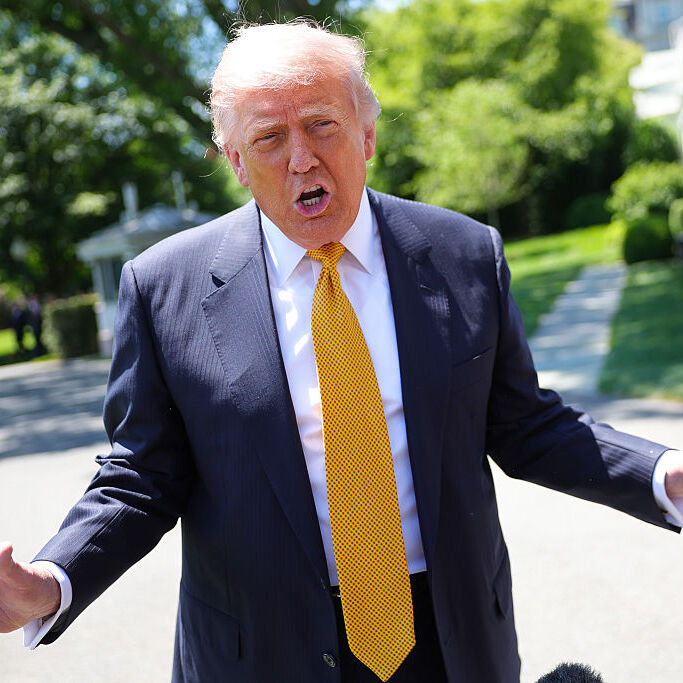 A photo of Donald Trump wearing a yellow tie