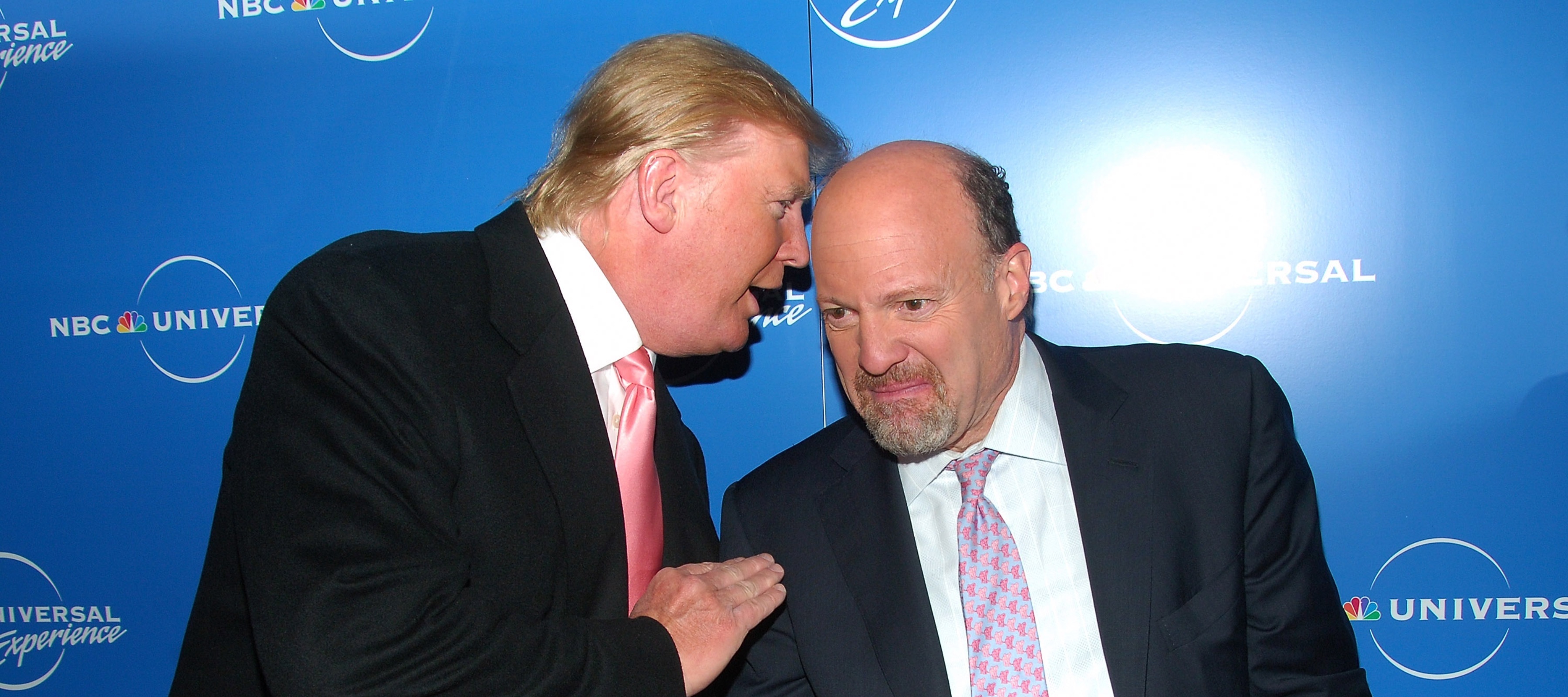 Donald Trump leans in to whisper into Jim Cramer's ear