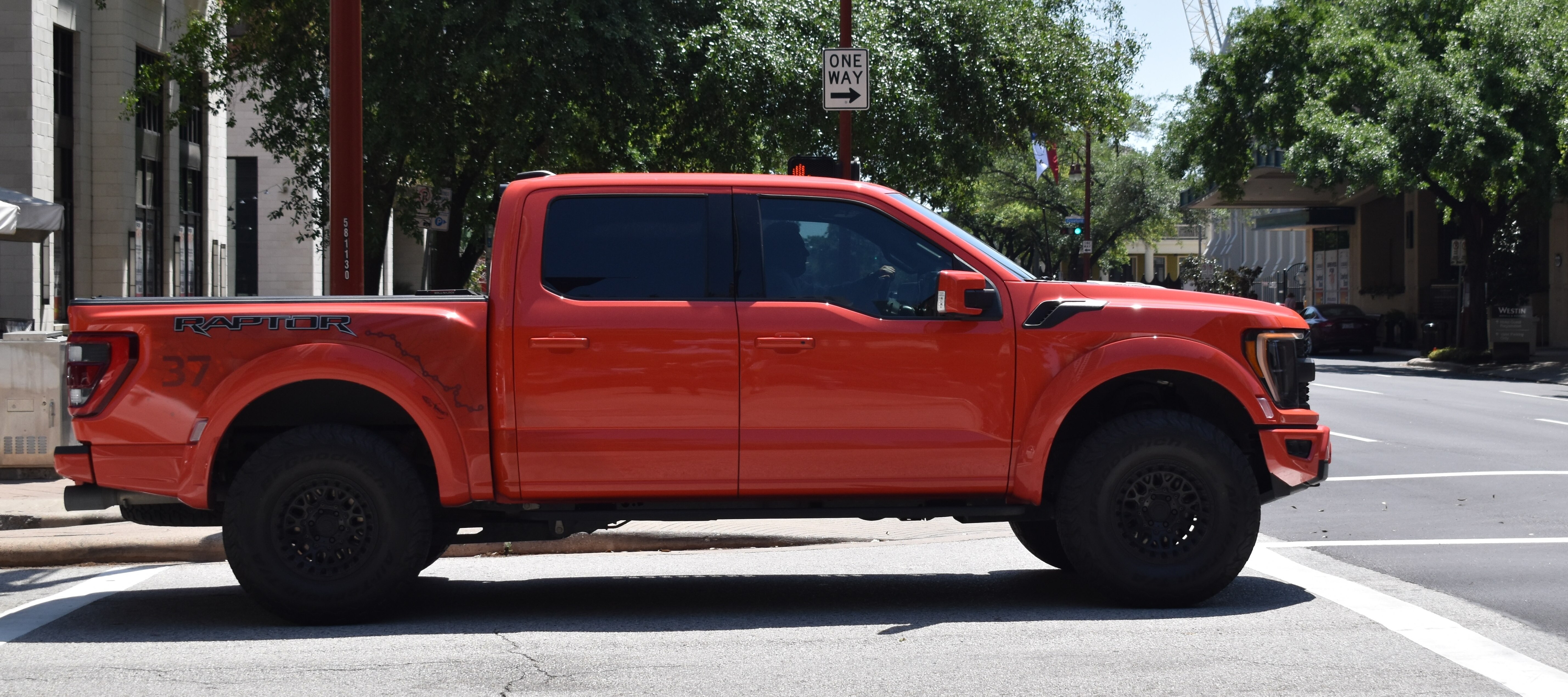 Ford F 150 Raptor entering an intersection