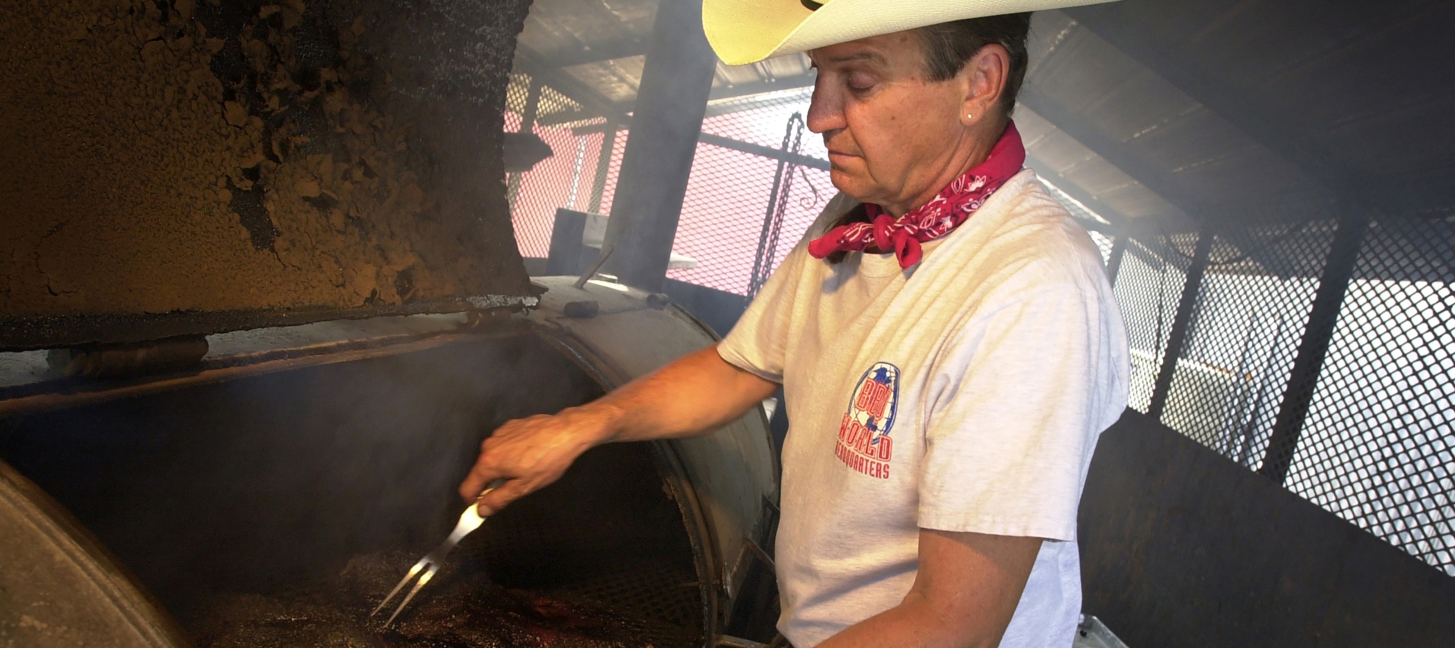 Barbecue pitmaster Duke Bischoff tends to brisket in Austin, Texas.