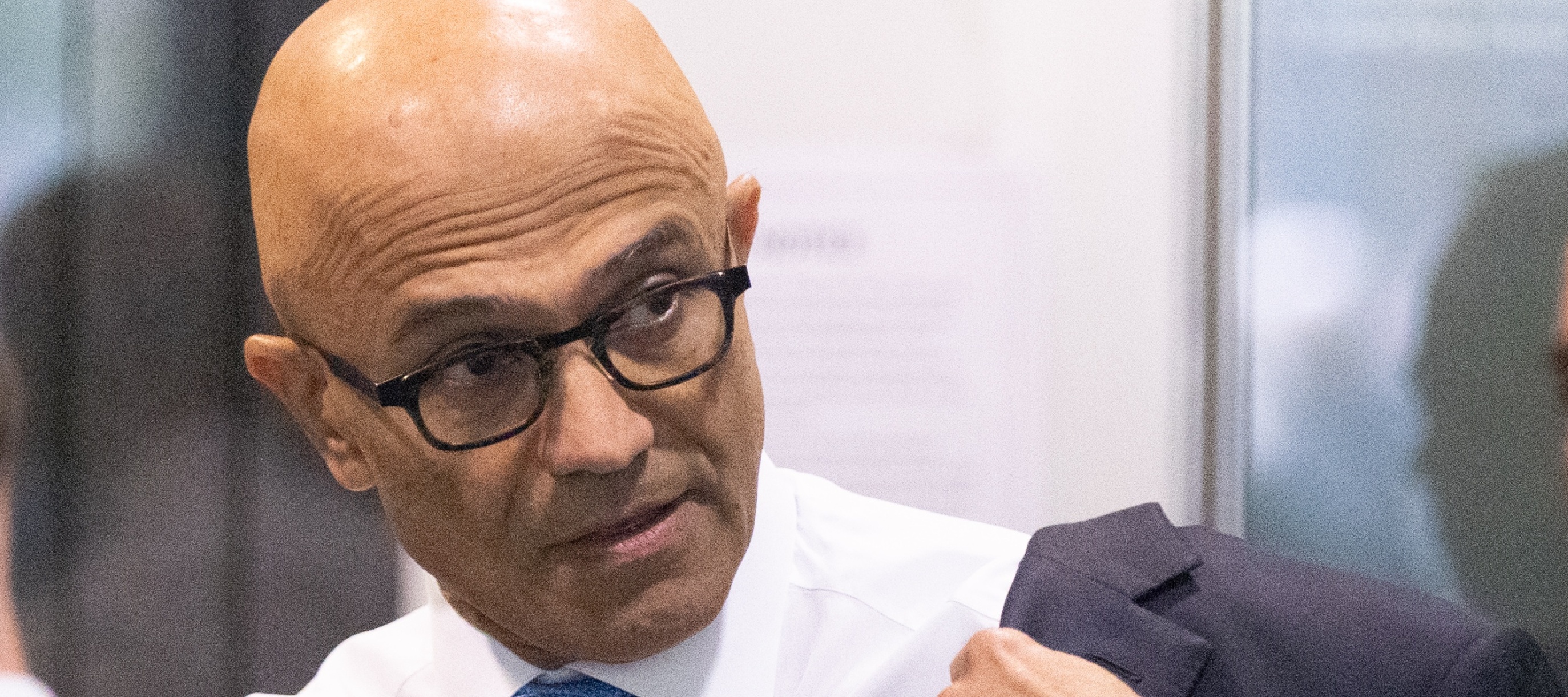 Microsoft CEO Satya Nadella seen removing his jacket at security