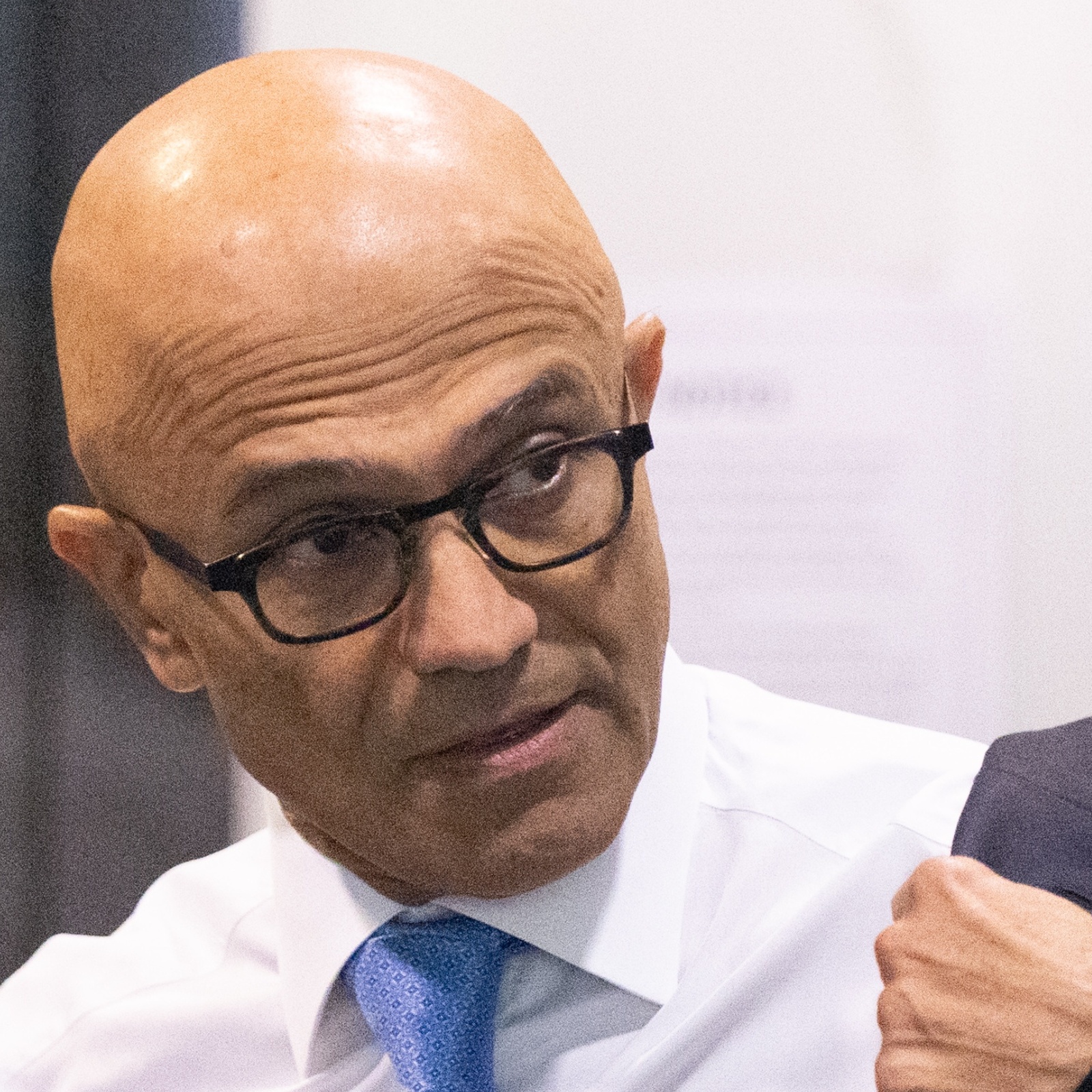 Microsoft CEO Satya Nadella seen removing his jacket at security