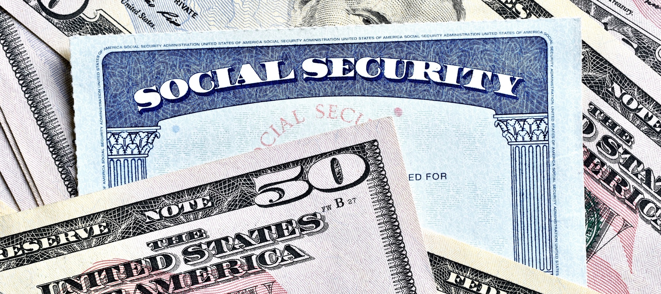 An overhead, detailed shot shows a Social Security card displayed with a partially obscured fifty dollar bill.