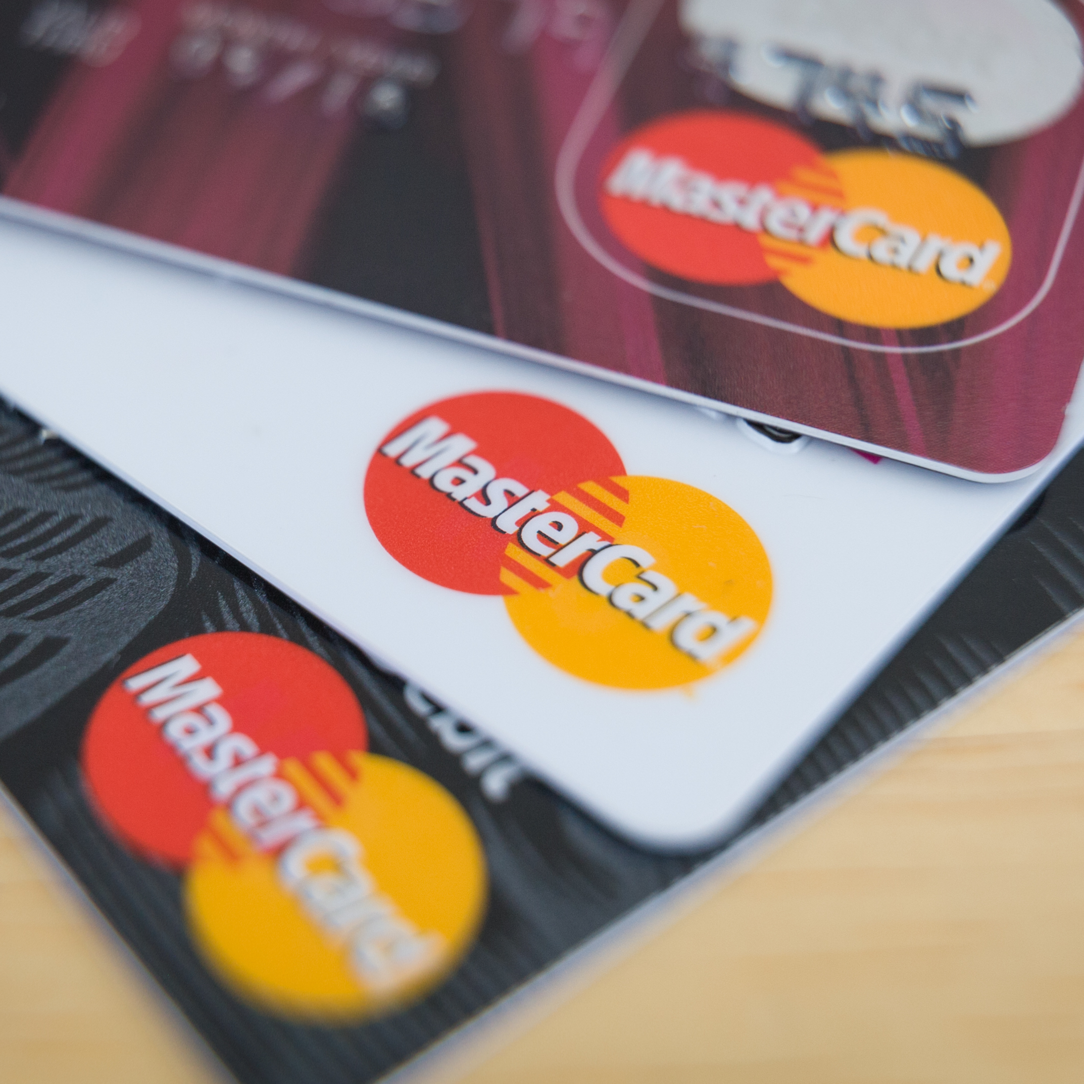 A collection of Mastercard credit cards.