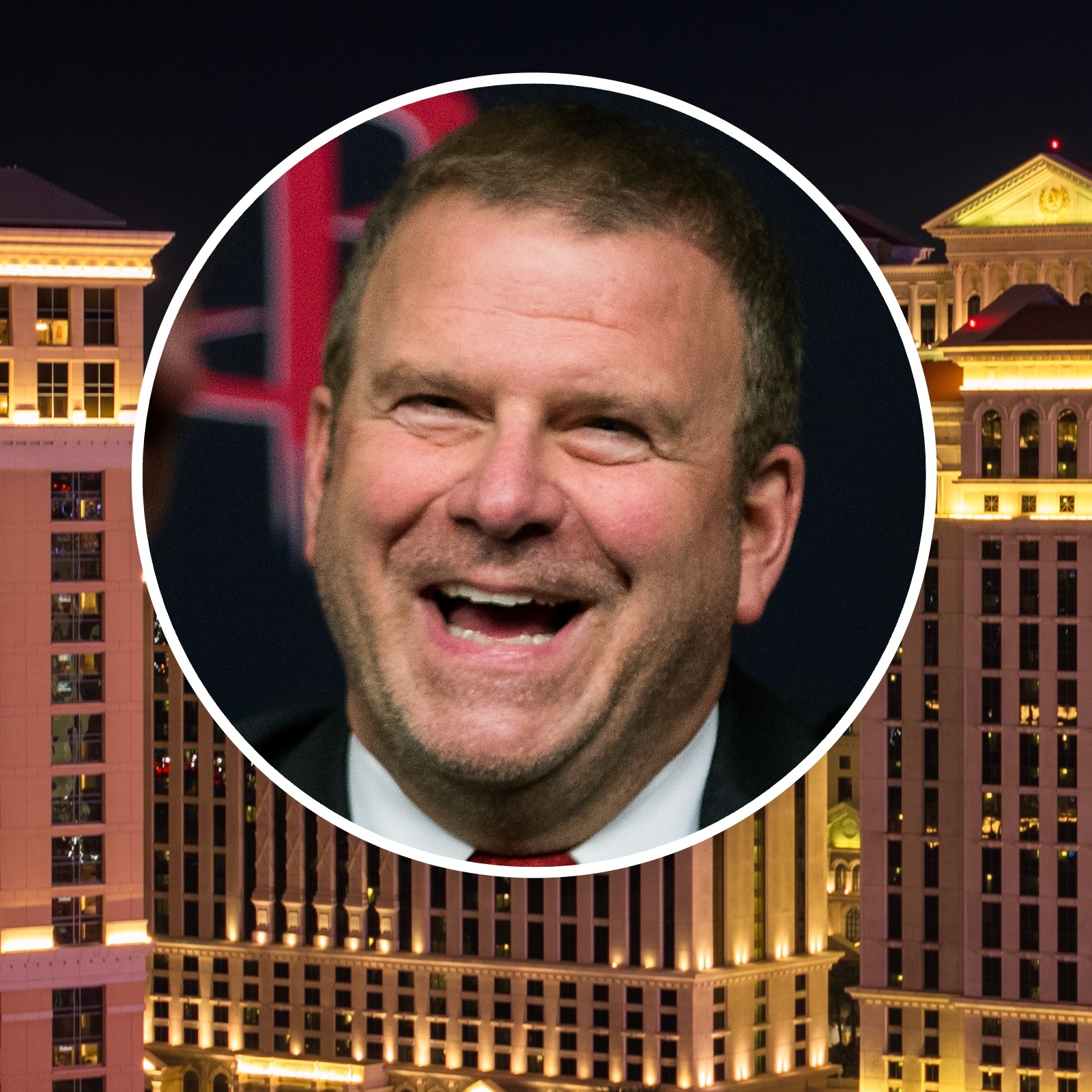A nighttime shot of Caesars Palace hotel and casino, with a bubble overlay of Tilman Fertitta's face