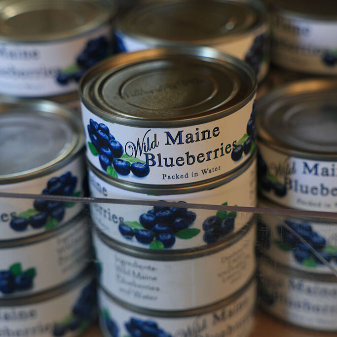 Items for sale containing wild blueberries line the shelves at the Wild Blueberry Heritage Center of Maine on August 10, 2025 in Columbia, Maine