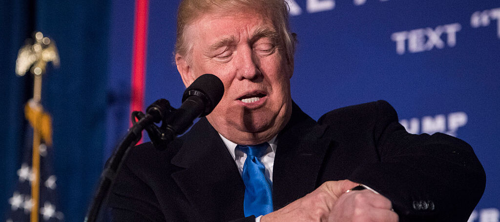 A photo of Donald Trump checking his watch