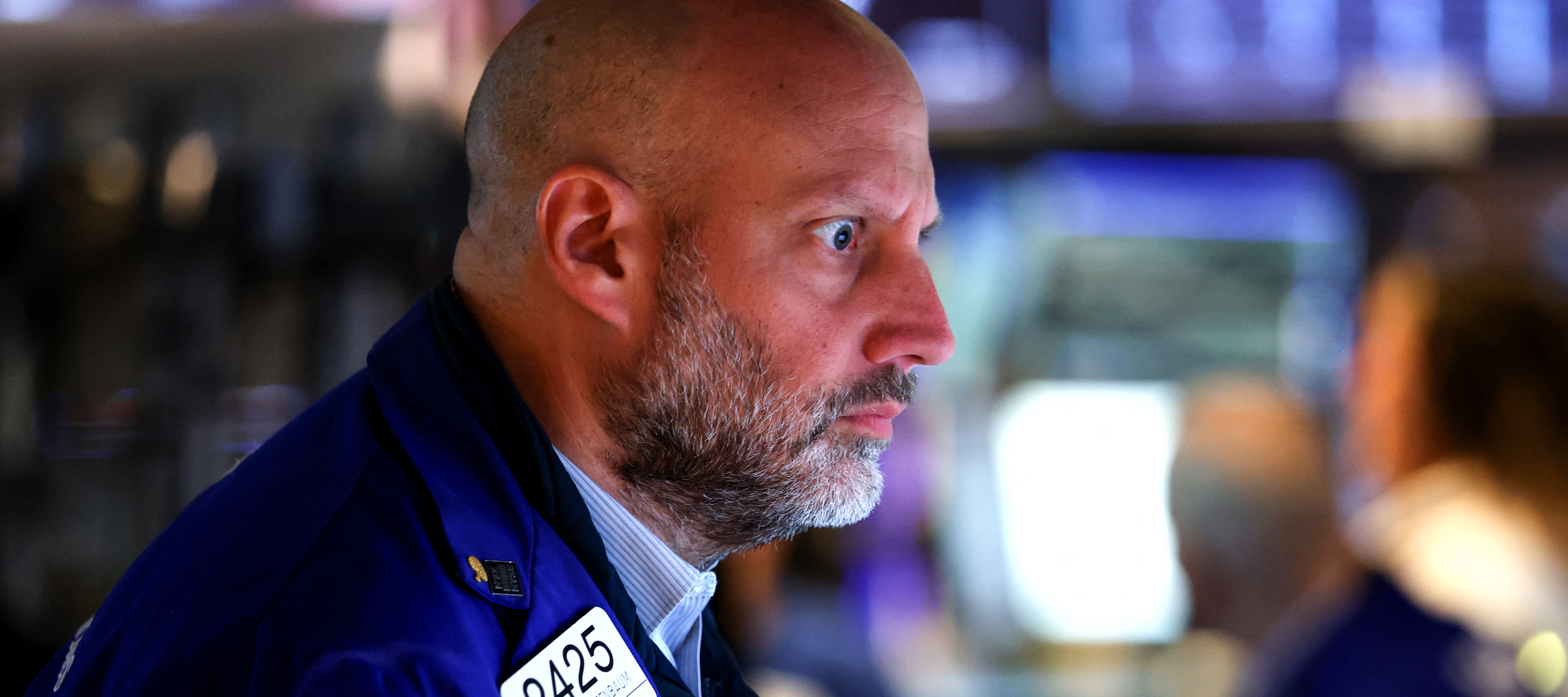 A trader works on the floor of the New York Stock Exchange (NYSE) following the opening bell in New York on April 16, 2026.