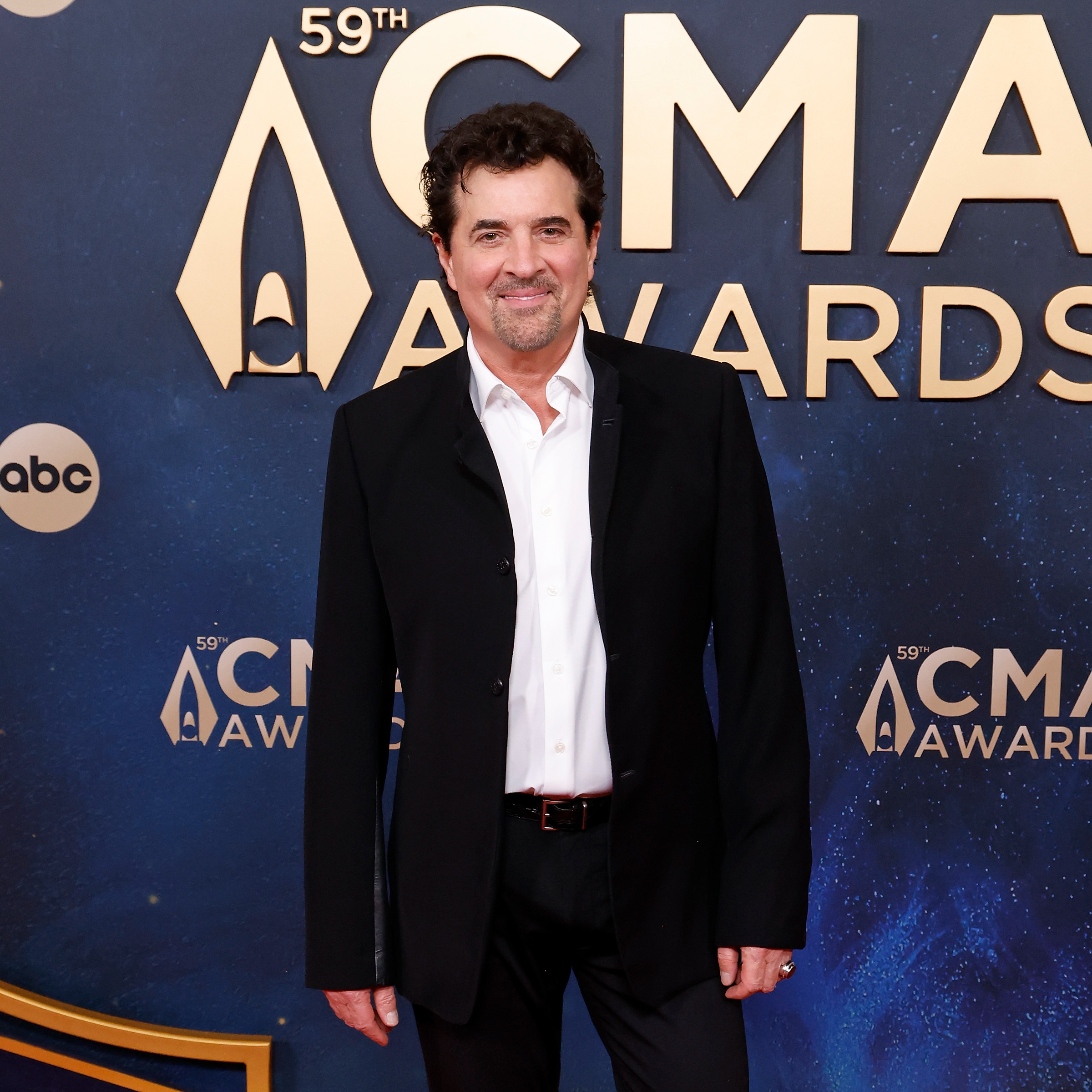 CEO Scott Borchetta walks the red carpet for a music awards ceremony.