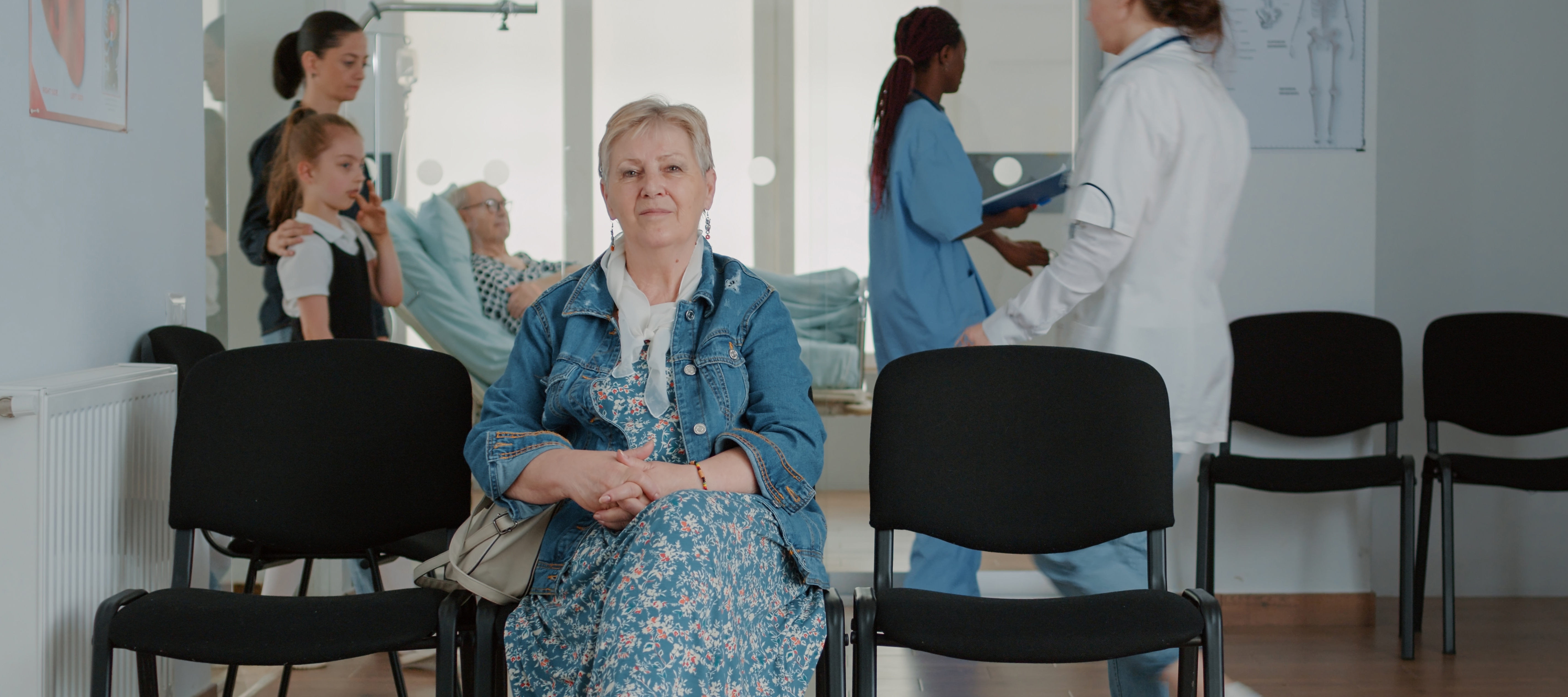 Older woman in doctor's office waiting room