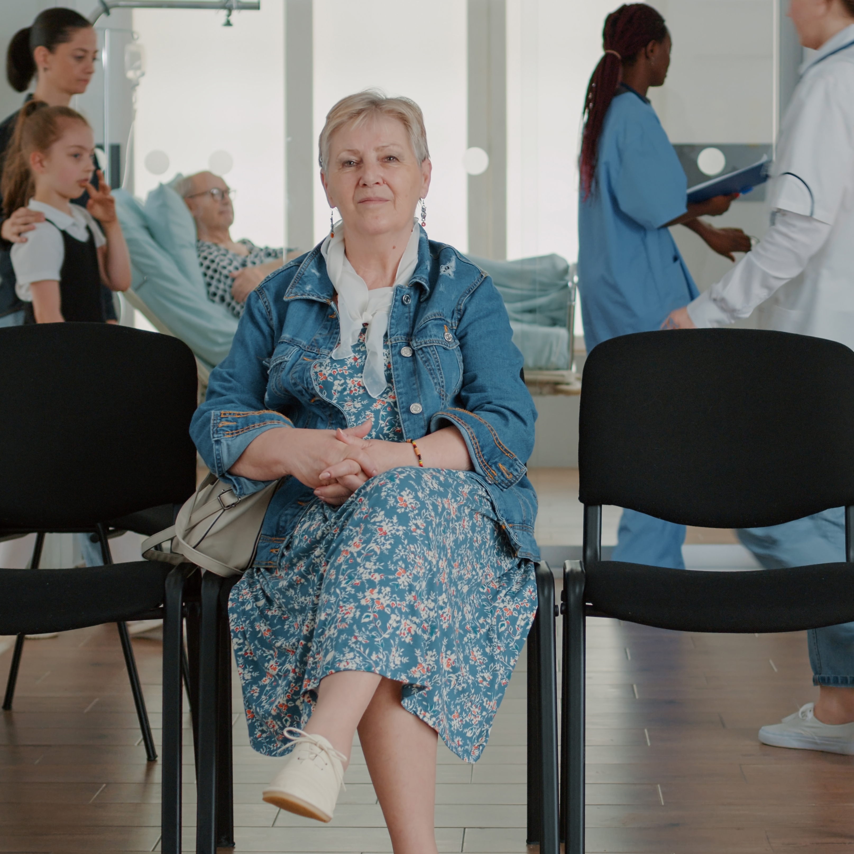 Older woman in doctor's office waiting room