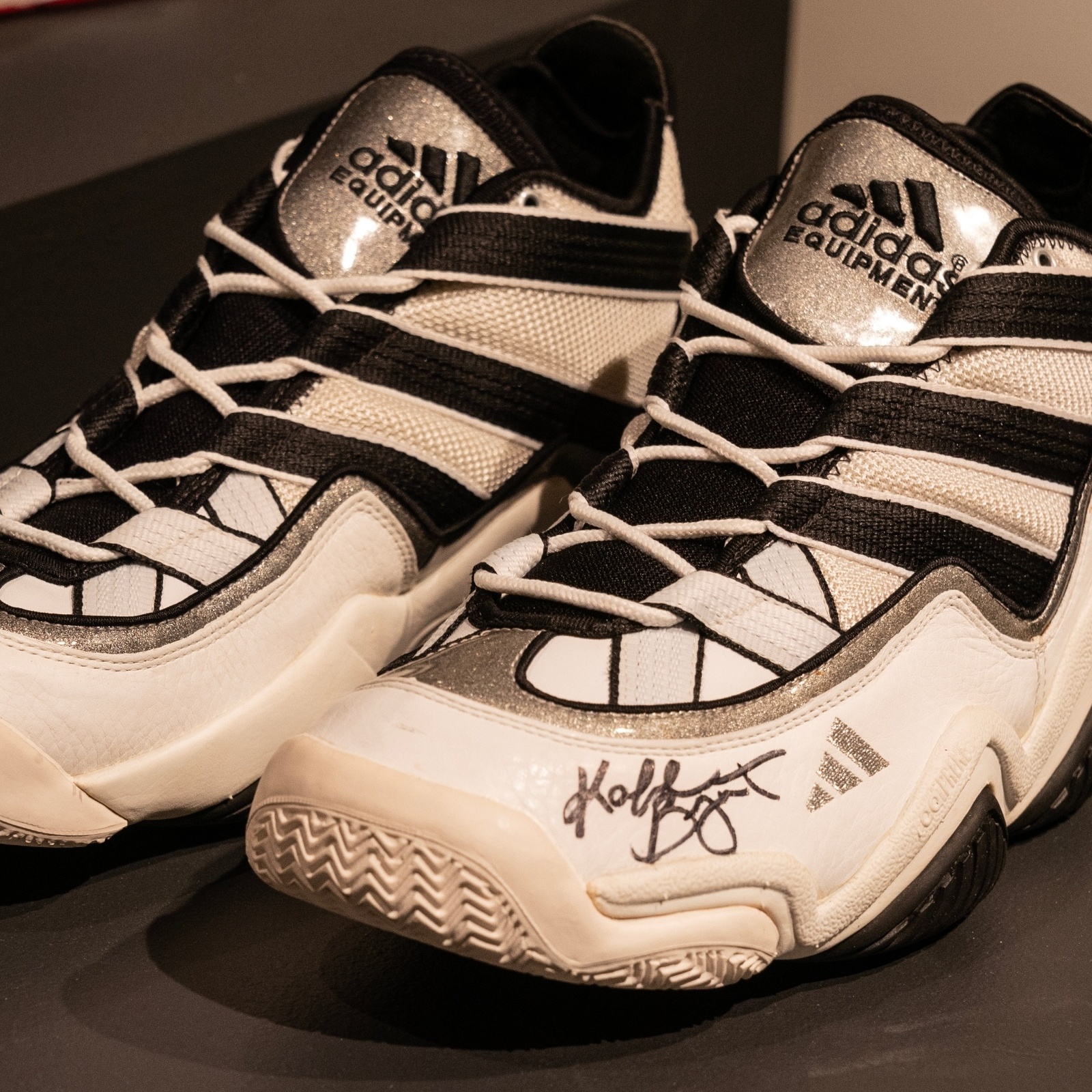 L: Red ferrari, R: Kobe Bryant worn and signed sneakers