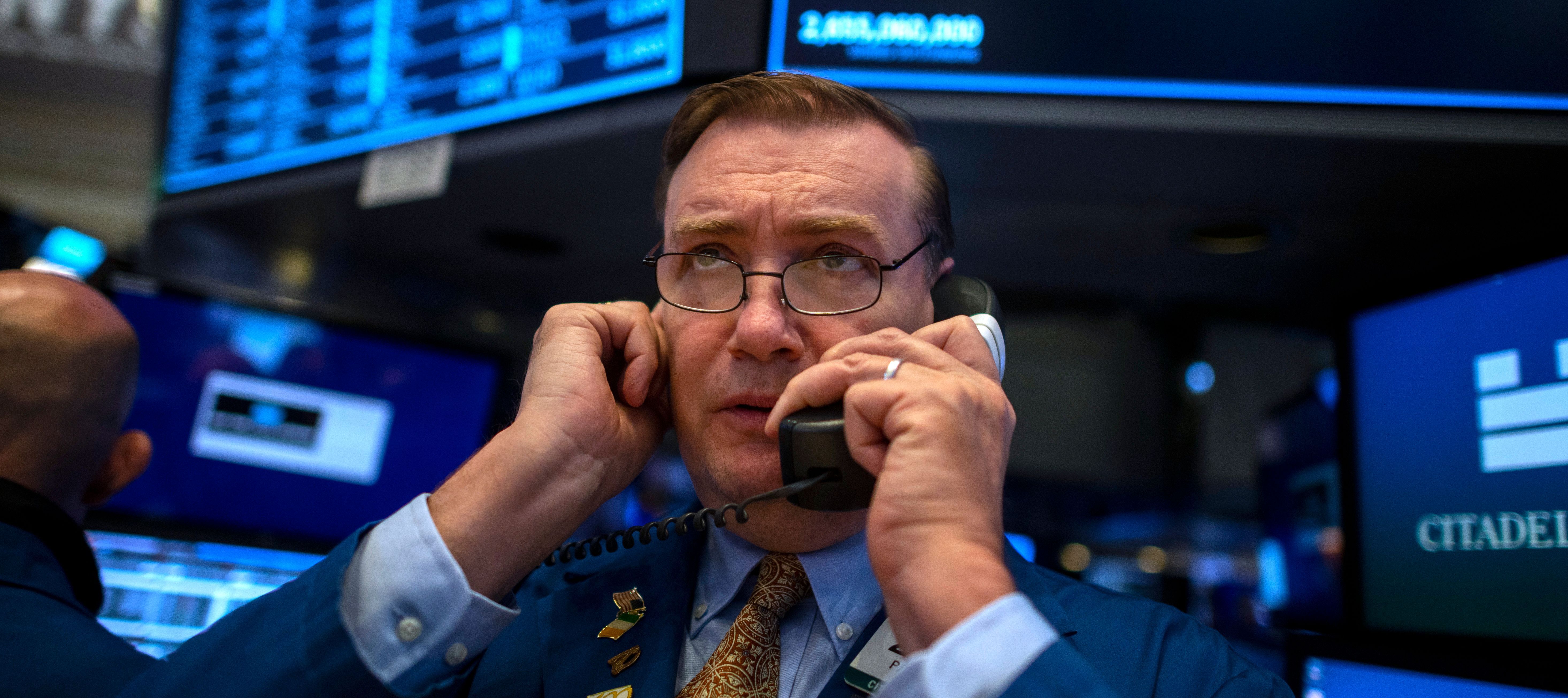 Traders work after the opening bell at the New York Stock Exchange.