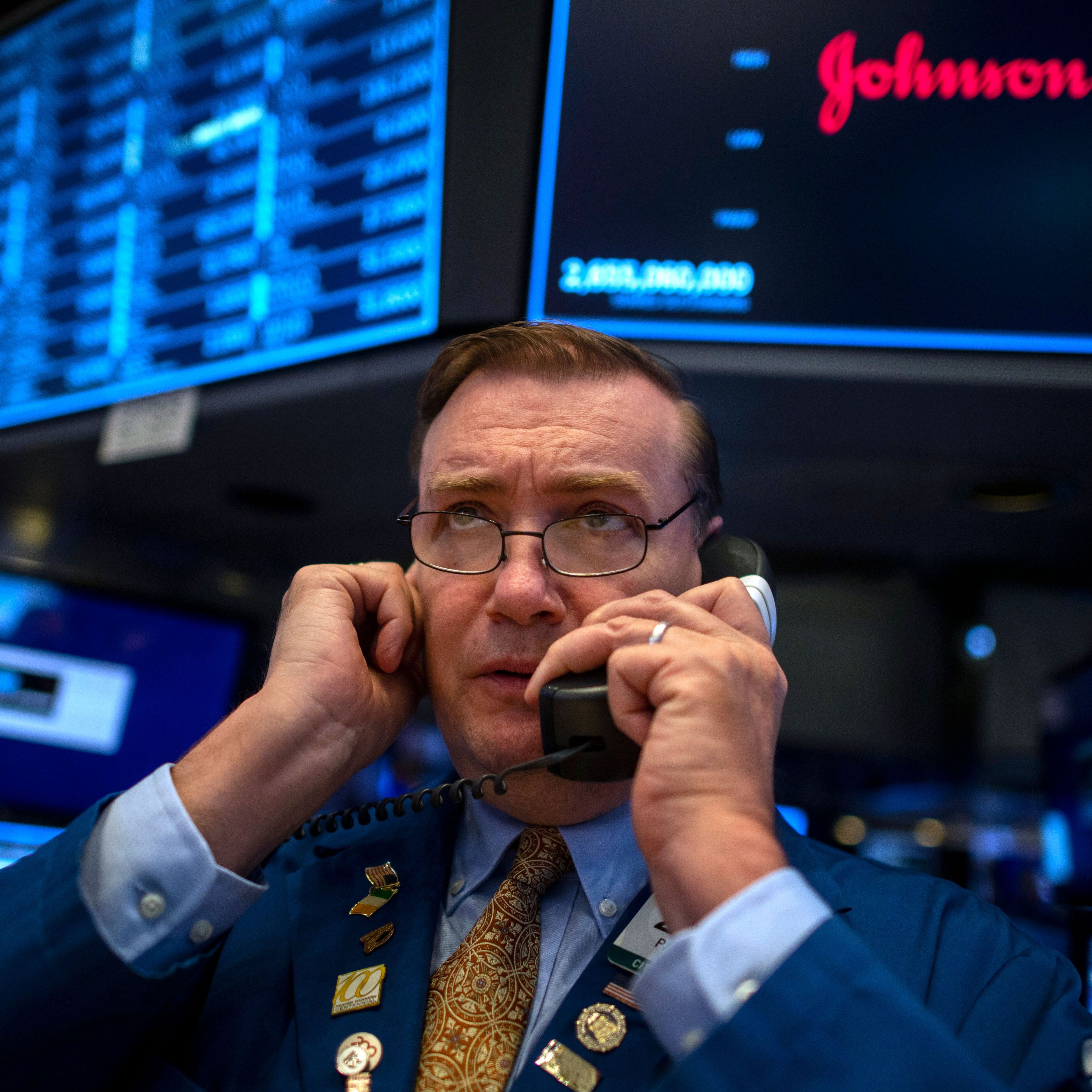 Traders work after the opening bell at the New York Stock Exchange.
