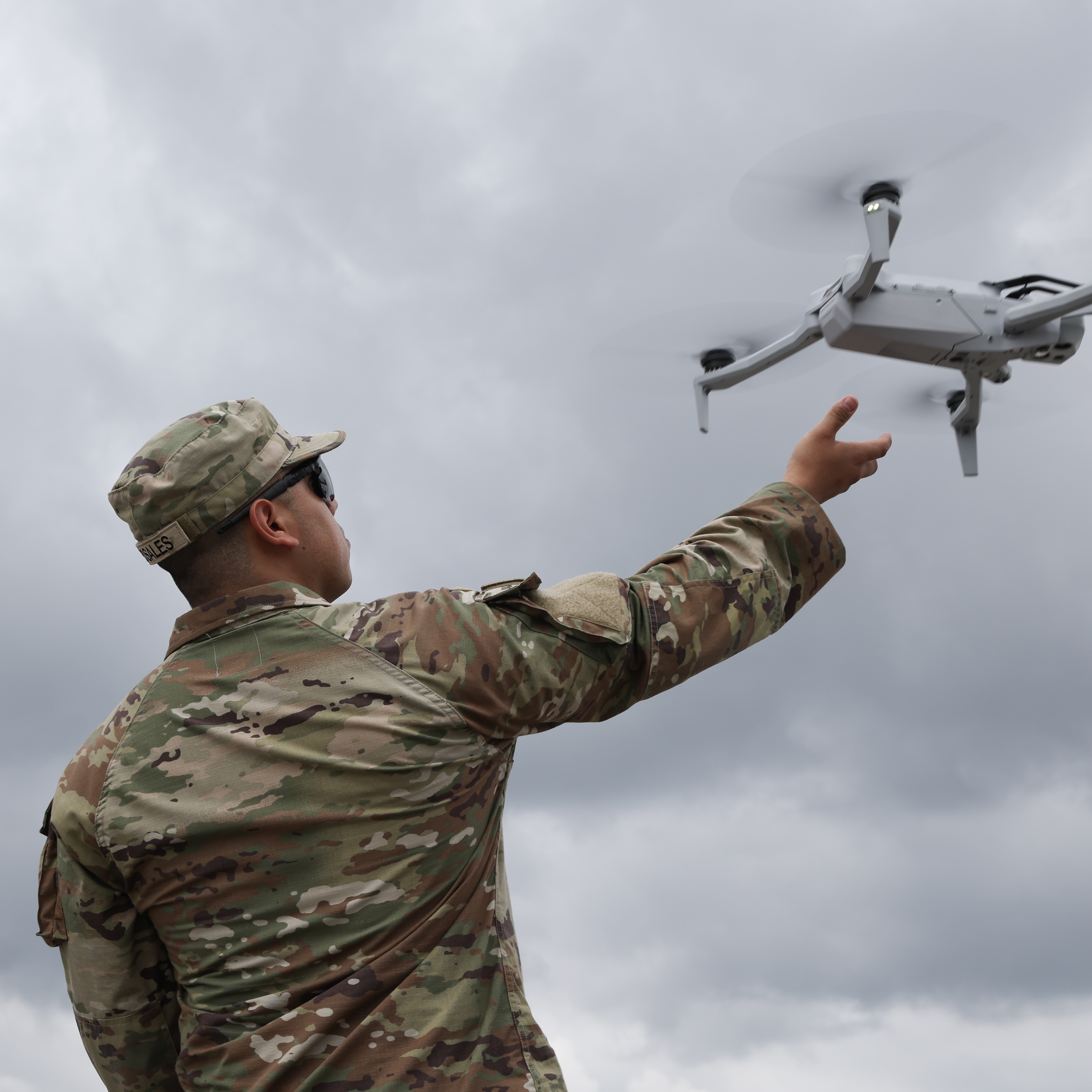 soldier with the 101st Airborne 2-327 Multi-Purpose Company catches a drone in the Pentagon parking lot on June 14, 2025.