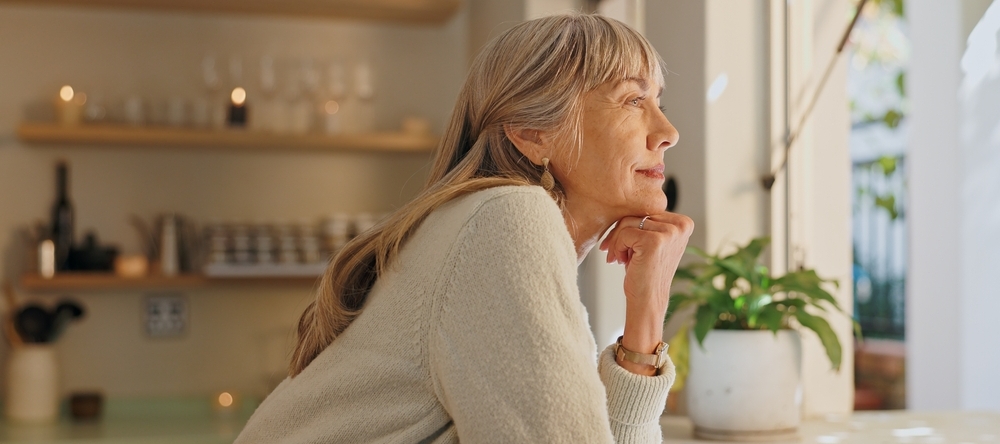 A photo of a middle-aged woman smiling