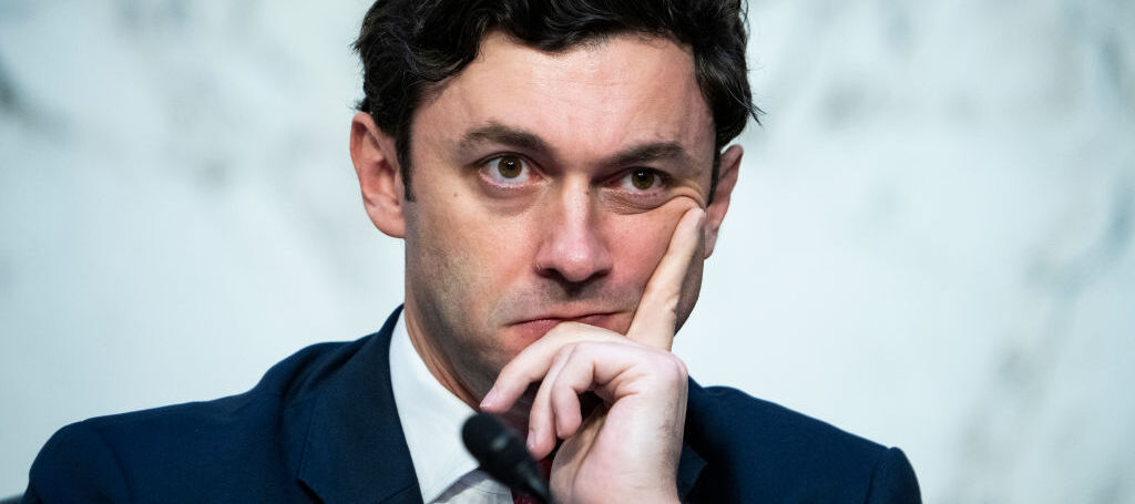 Sen. Jon Ossoff, D-Ga., listens to Peiter Mudge Zatko, former head of security at Twitter, testify in 2022.